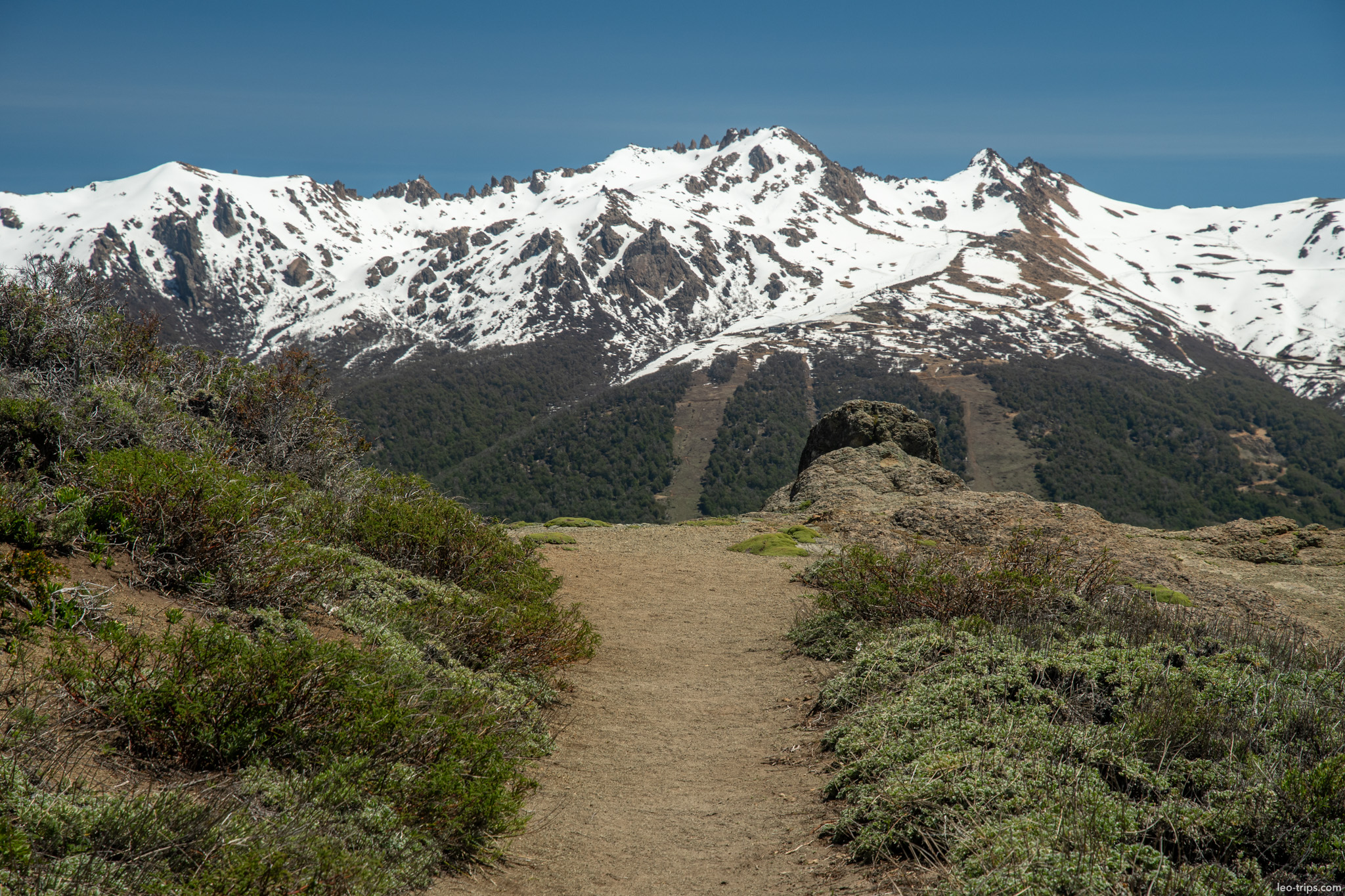 hiking path toward snow mountains cerro otto trail