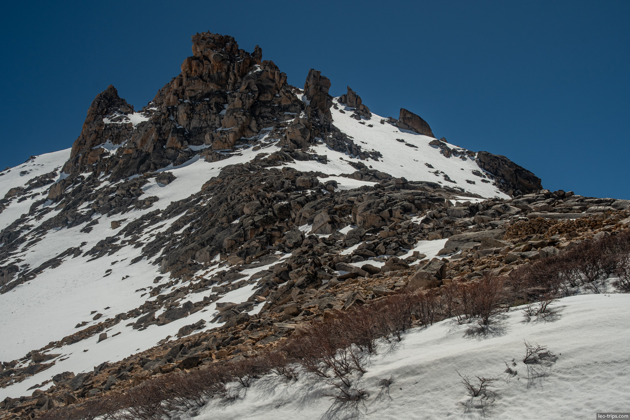rugged peak with scree slope frey refuge trail