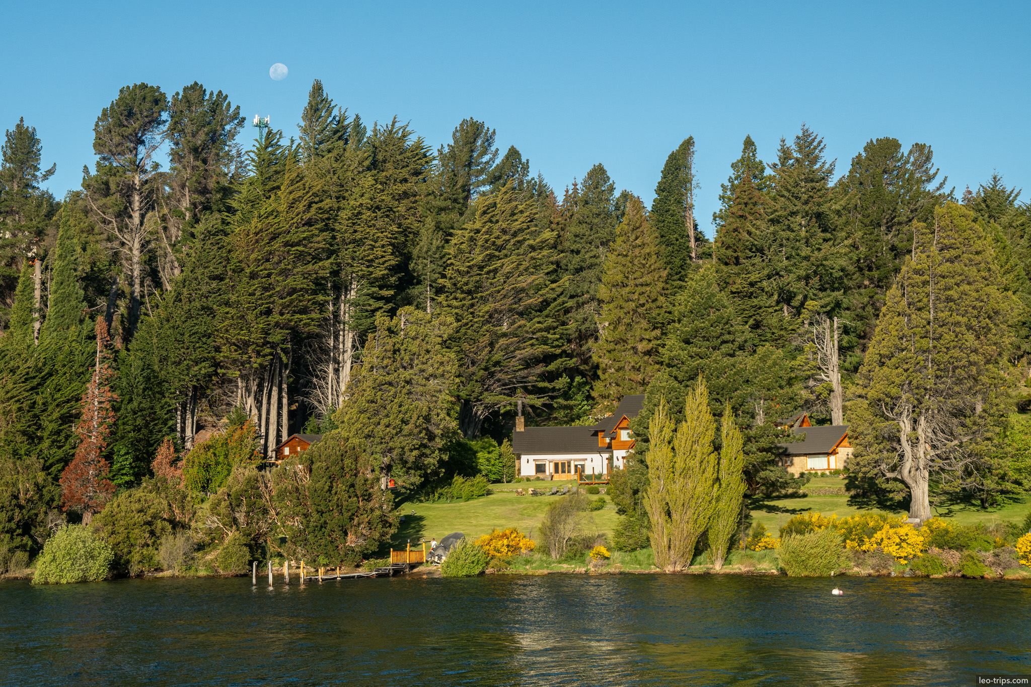 lakeside houses under full moon puerto blest