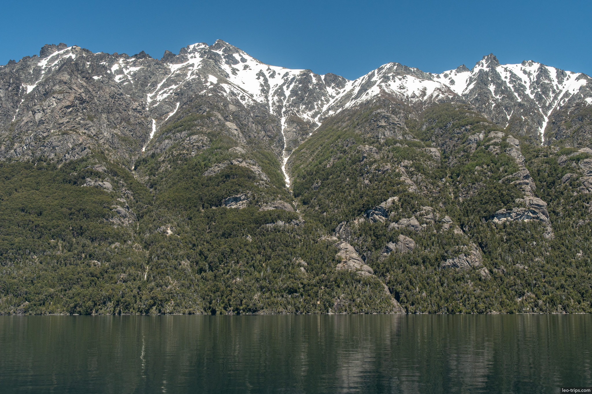 snowy mountain range above lake puerto blest