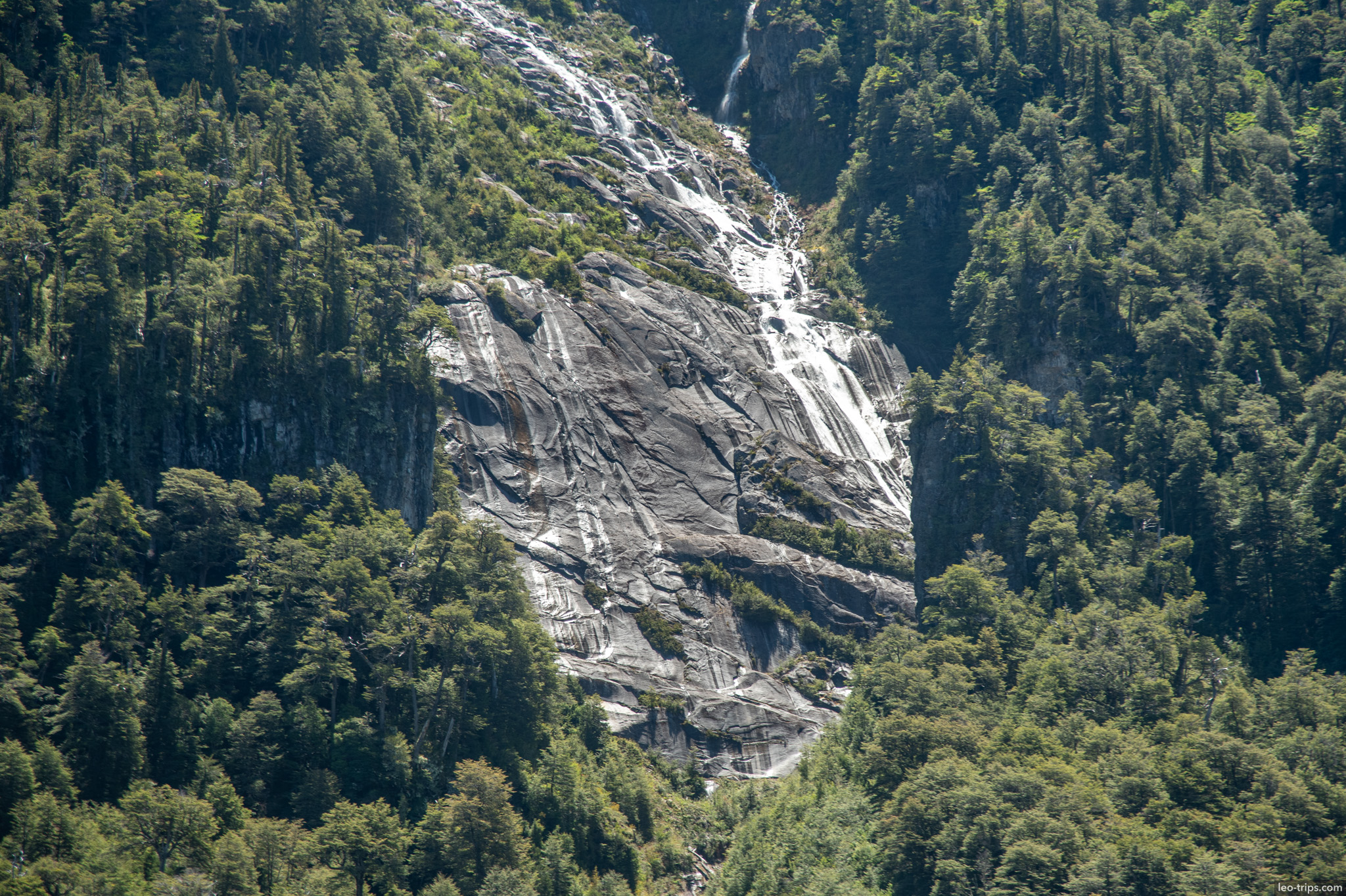 waterfall cascading down granite face puerto blest