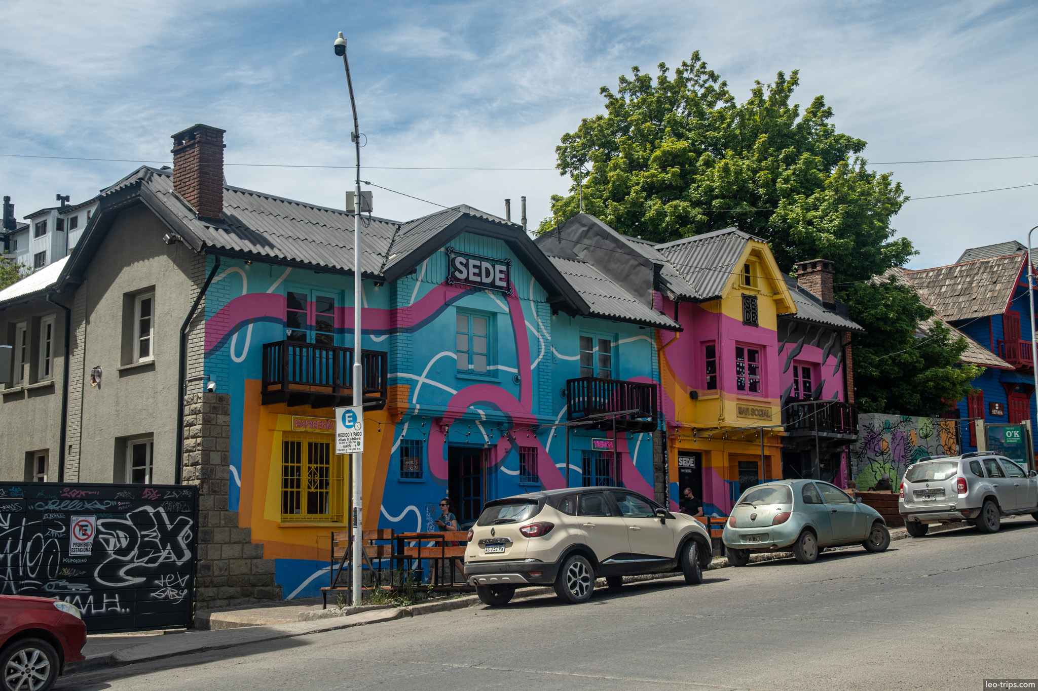 colorful mural houses street san carlos de bariloche