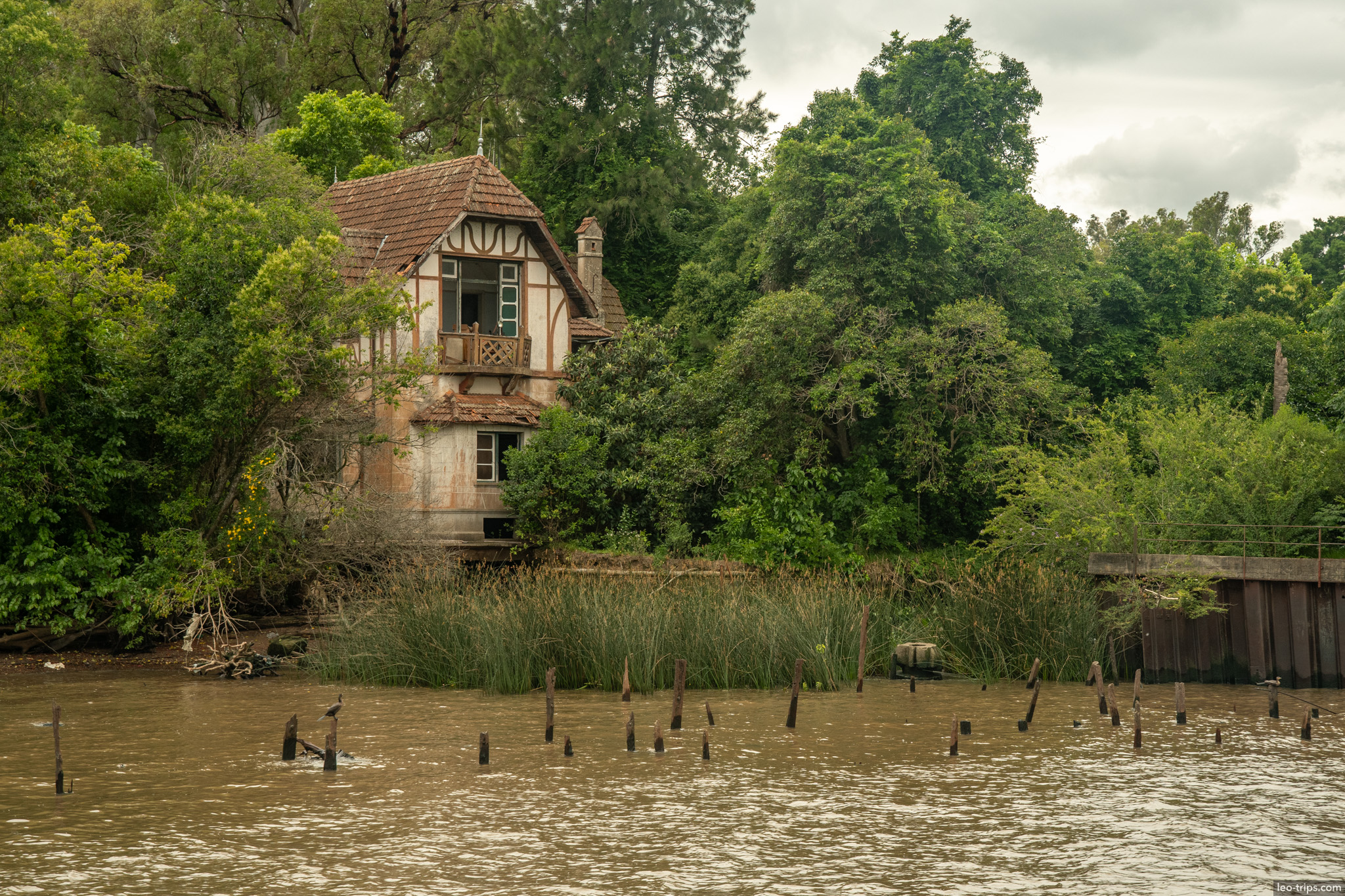 abandoned tudor mansion overgrown riverbank tigre