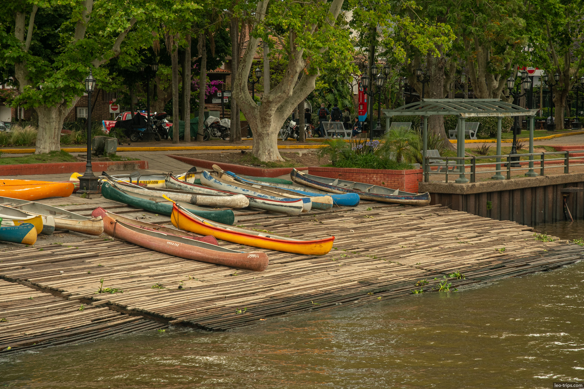 canoes lined up wooden pier tigre