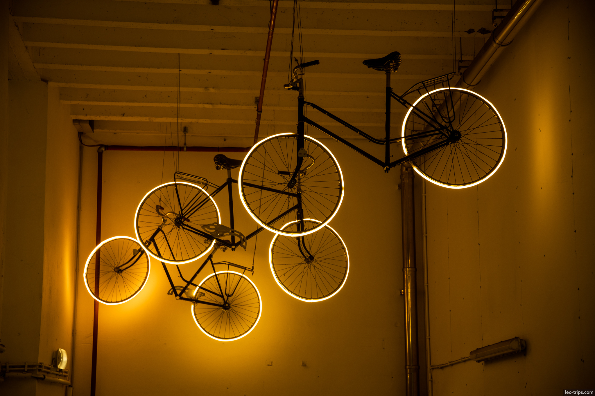 bruges bicycle neon light art installation interior bruges