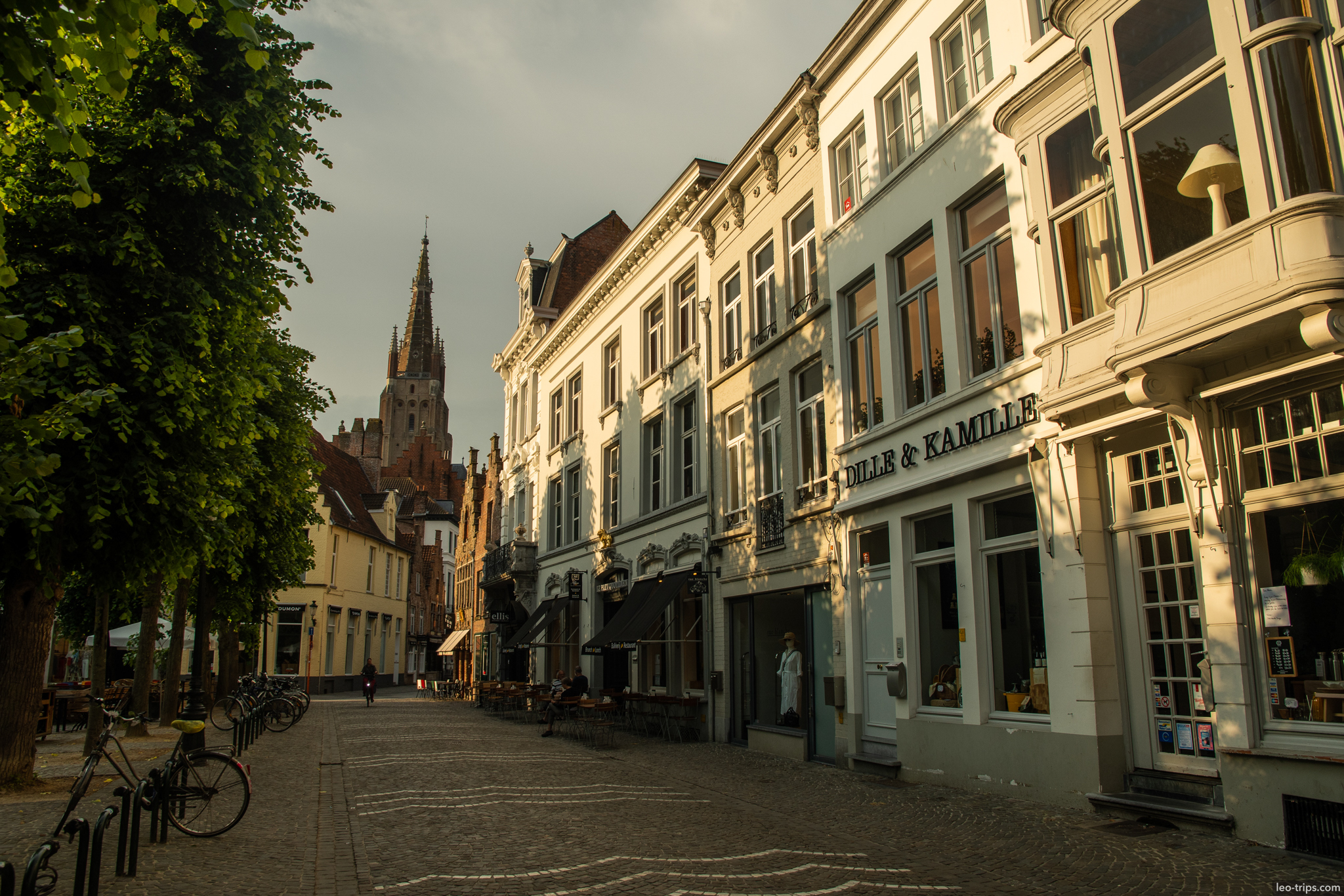 bruges dille kamille square church spire morning bruges