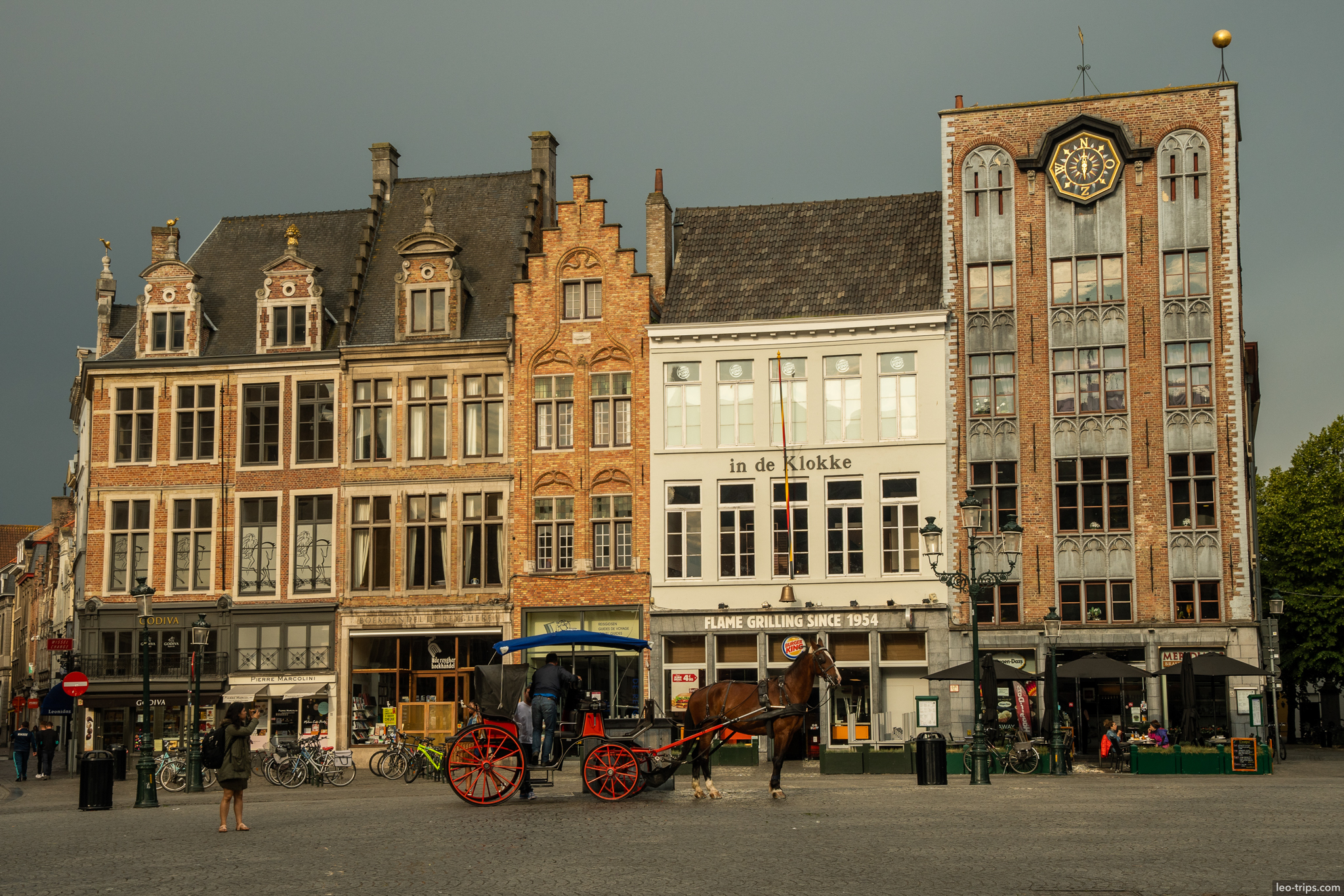 bruges markt square horse carriage historic facades bruges