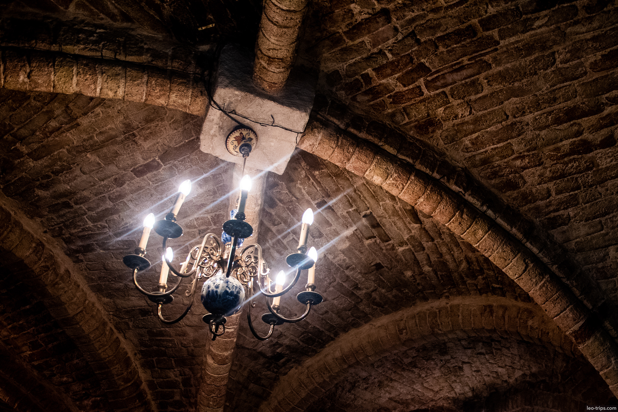 bruges medieval cellar chandelier brick vault bruges