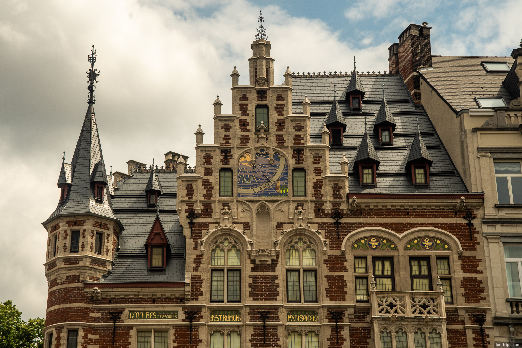 brussels neo gothic building with sundial brussels