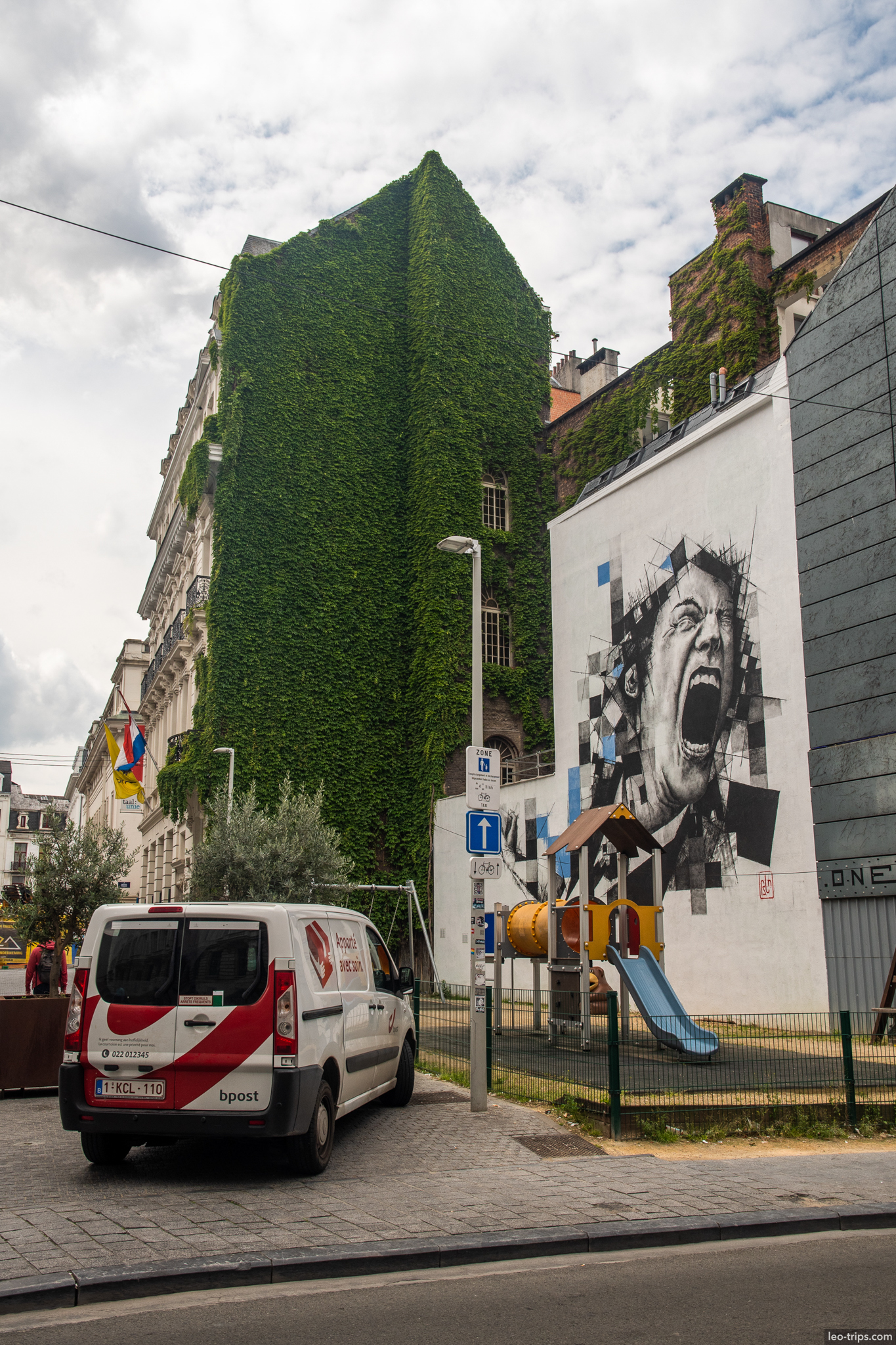 brussels street art mural ivy building brussels