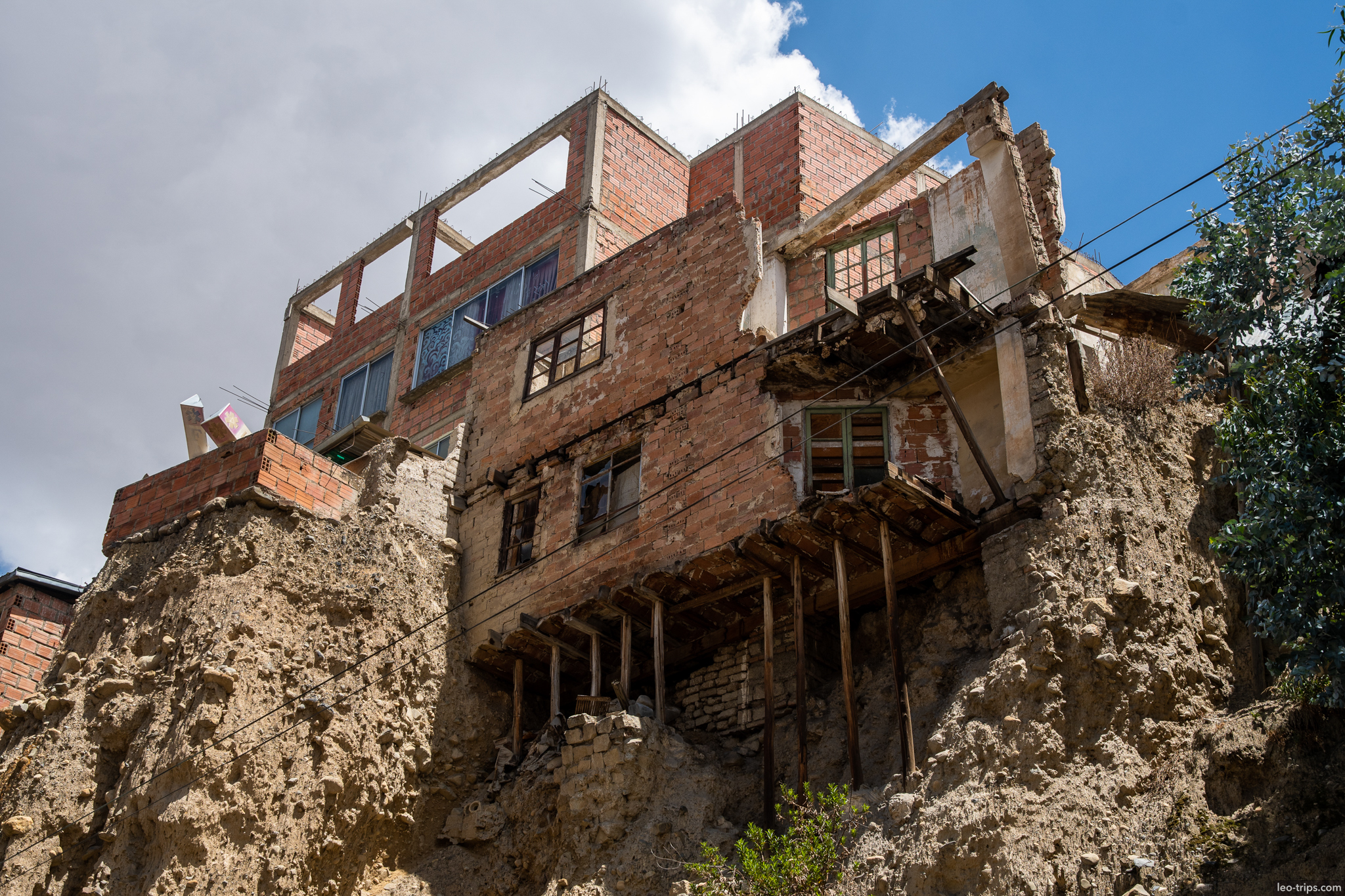 la paz crumbling house on eroded cliff la paz