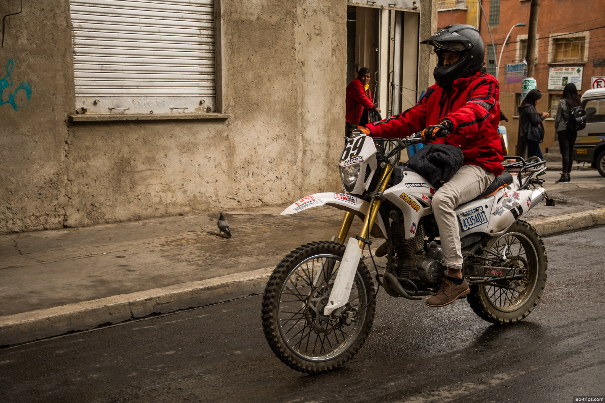 la paz dirt bike rider red jacket street la paz