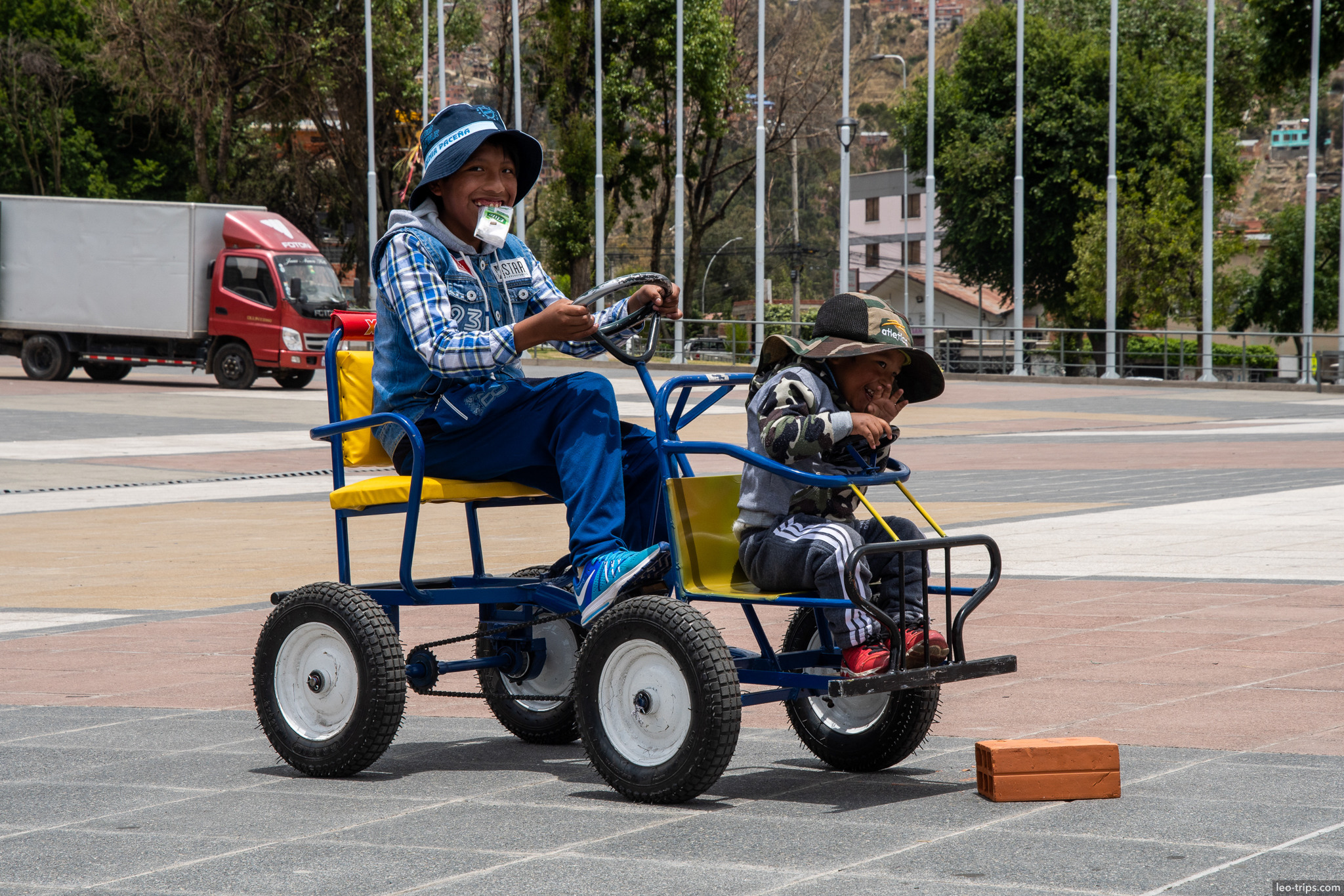 la paz kids riding pedal car plaza la paz
