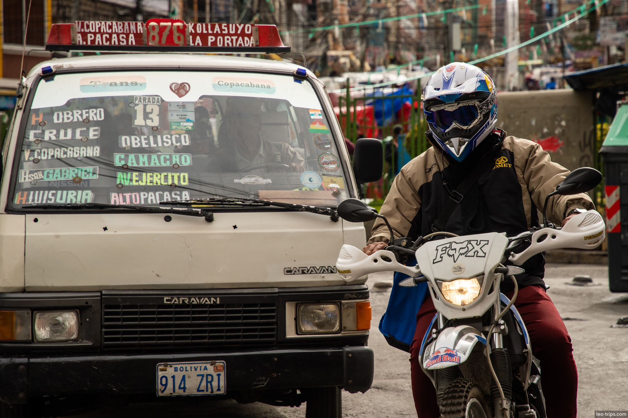 la paz minibus route signs motorcyclist street la paz