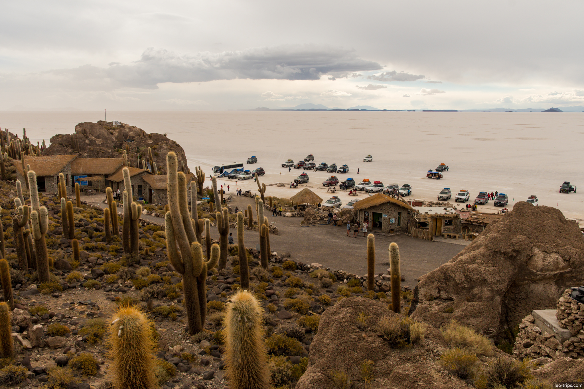 isla incahuasi parking tourist cars stone huts salar de uyuni