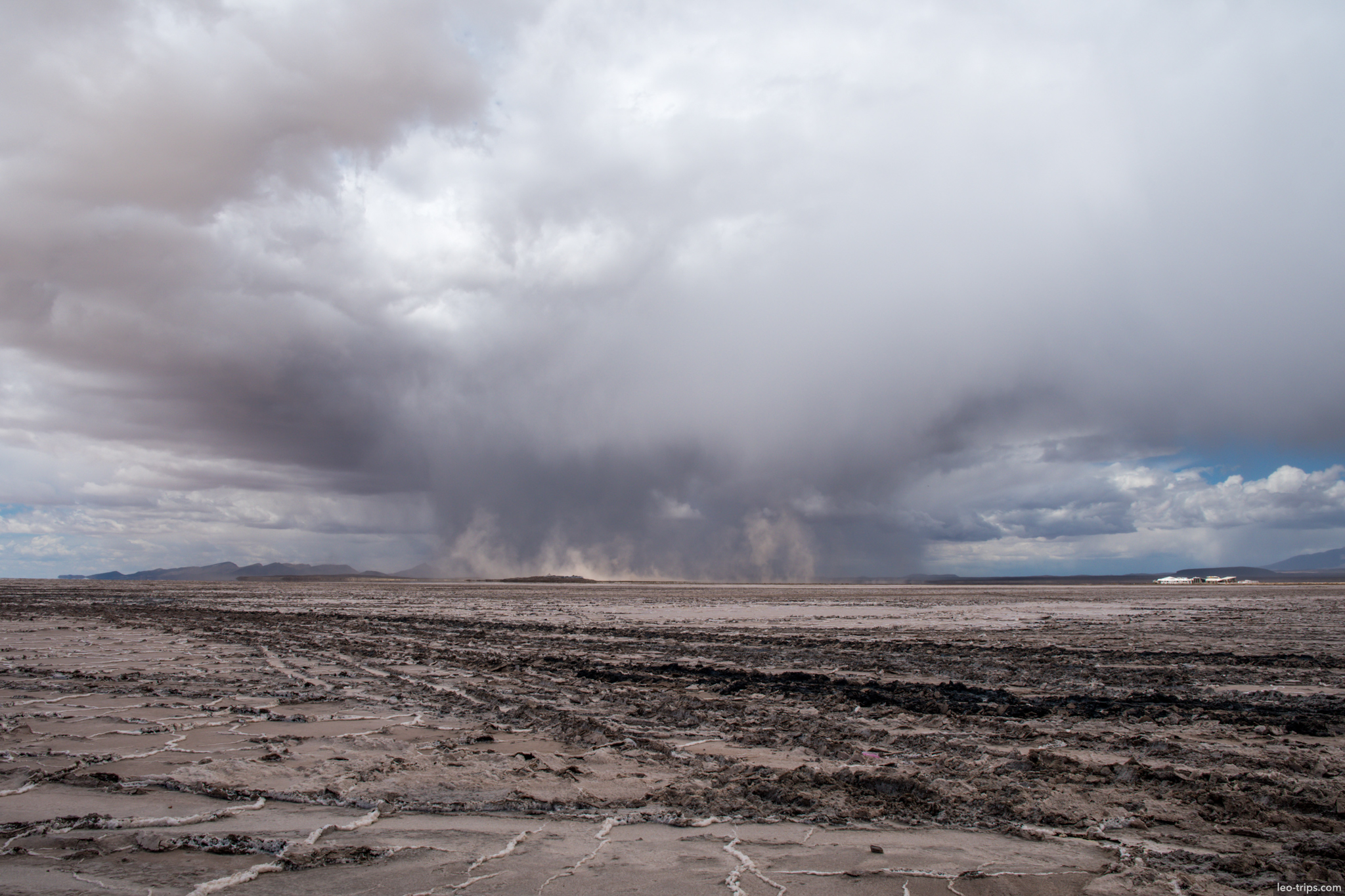 salar de uyuni dust storm dark clouds tracks salar de uyuni