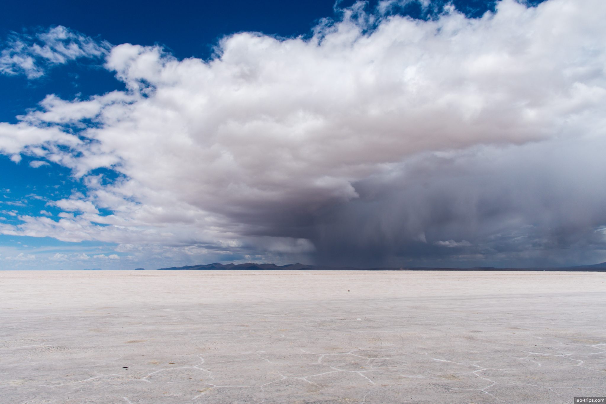 salar de uyuni massive storm cloud white flat salar de uyuni