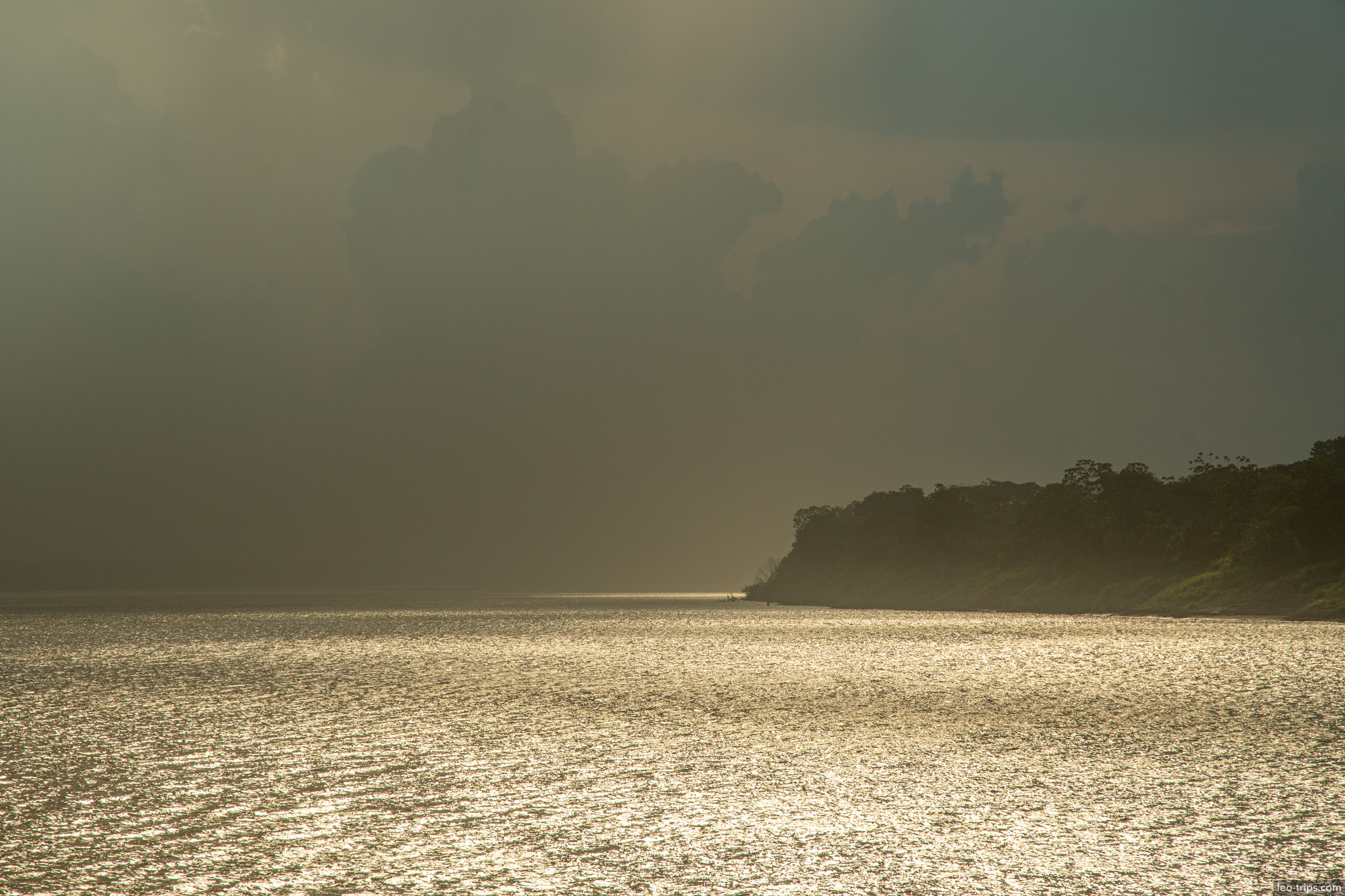 dark clouds over amazon amazon river