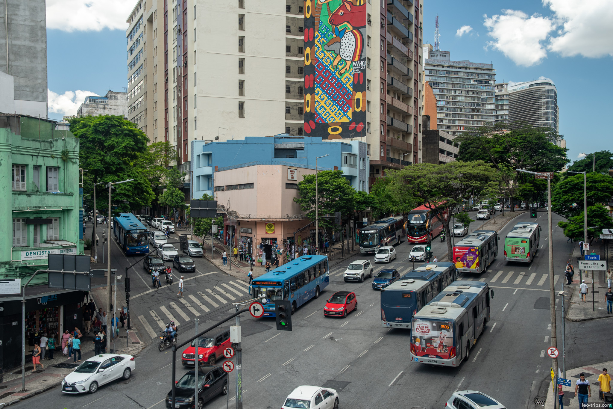 giant mural busy avenue buses downtown belo horizonte