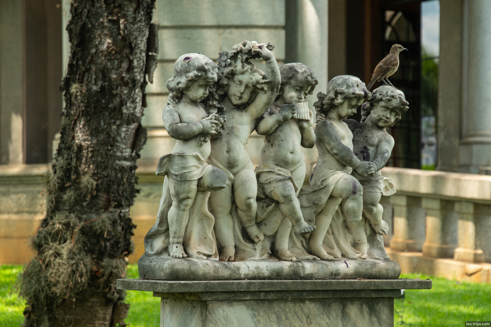 marble cherubs sculpture with bird palace garden belo horizonte
