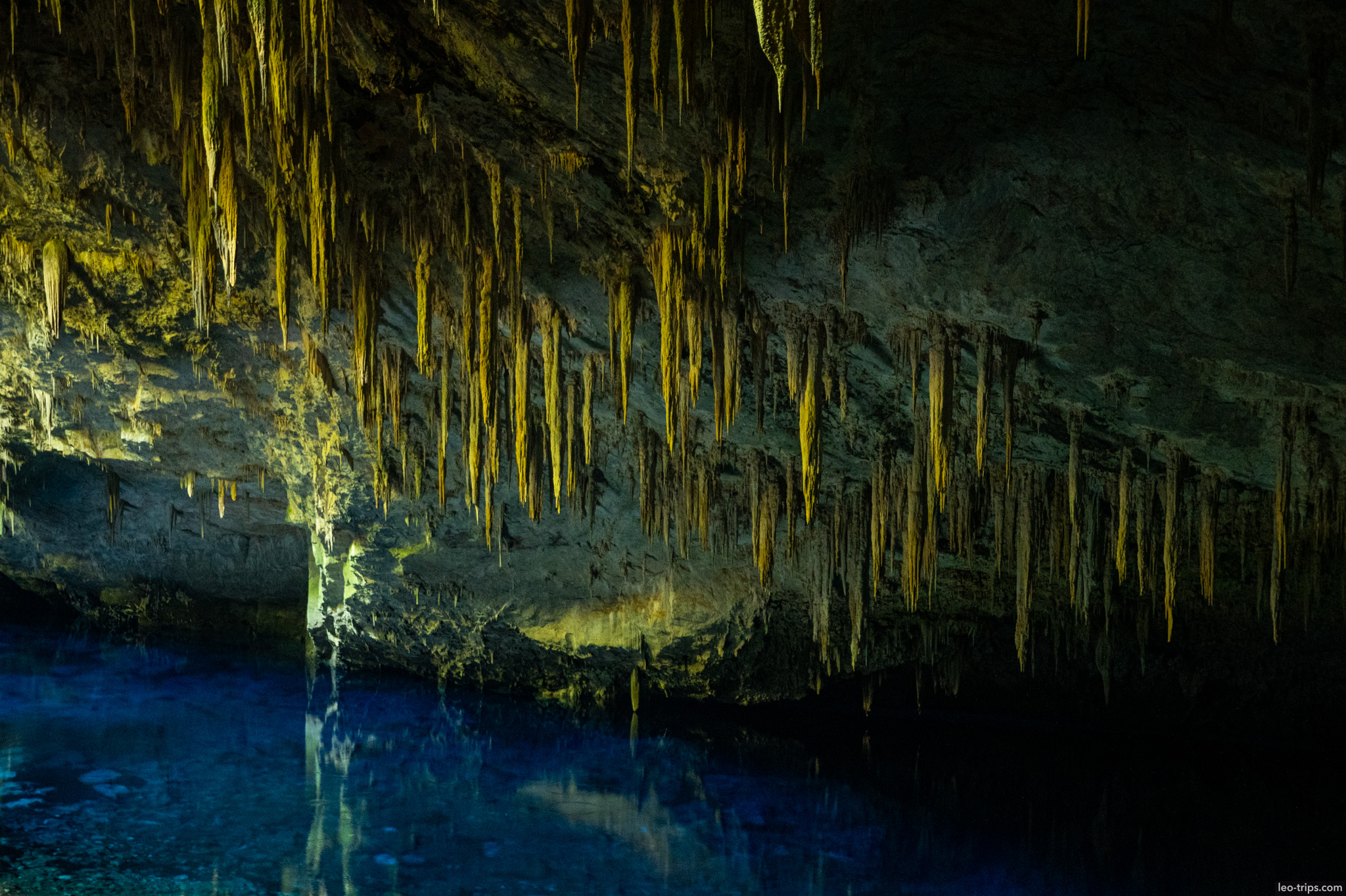 stalactites reflected in blue lake gruta do lago azul gruta do lago azul