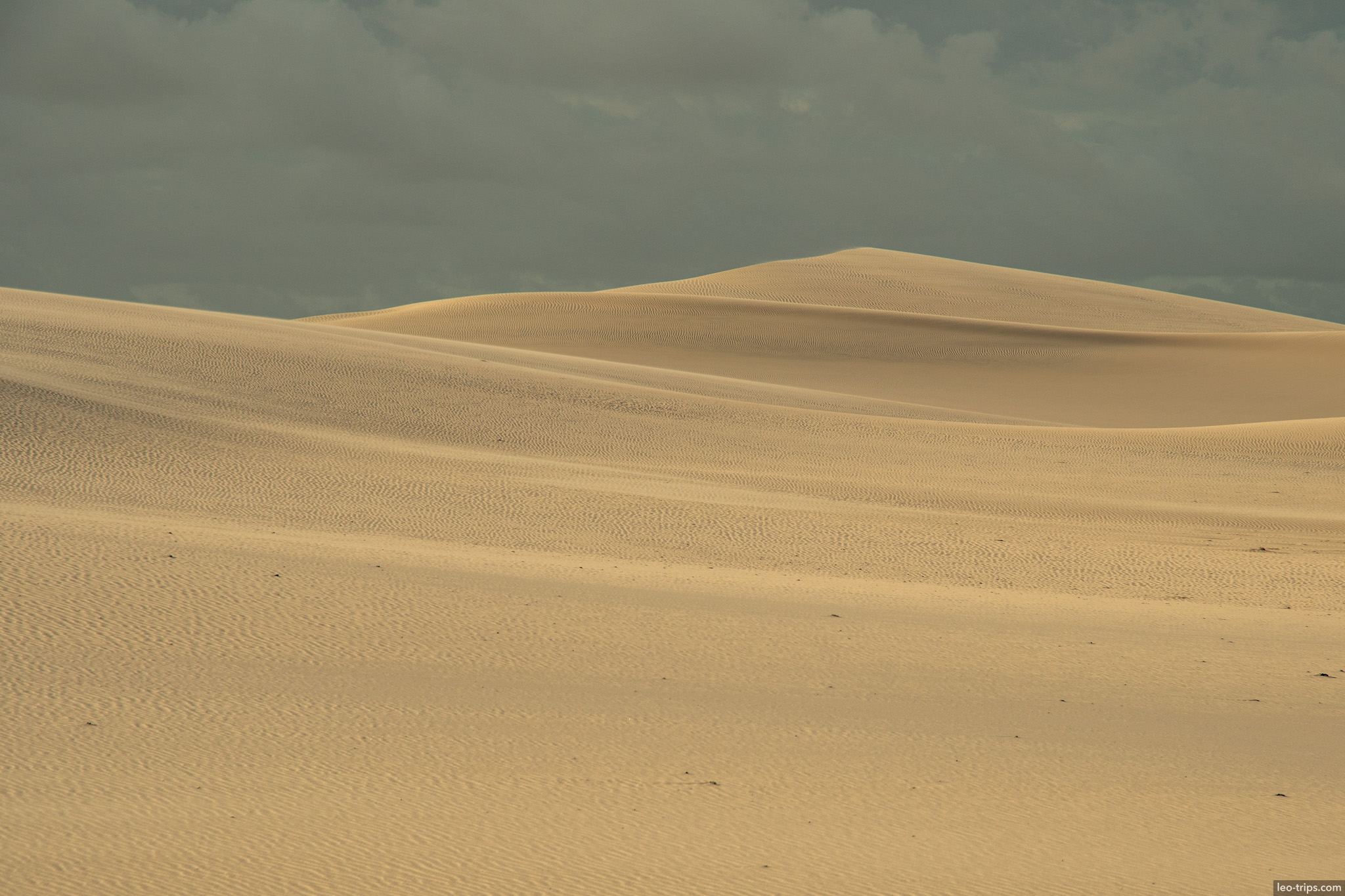 layered sand dune ridges stormy sky lencois lencois maranhenses