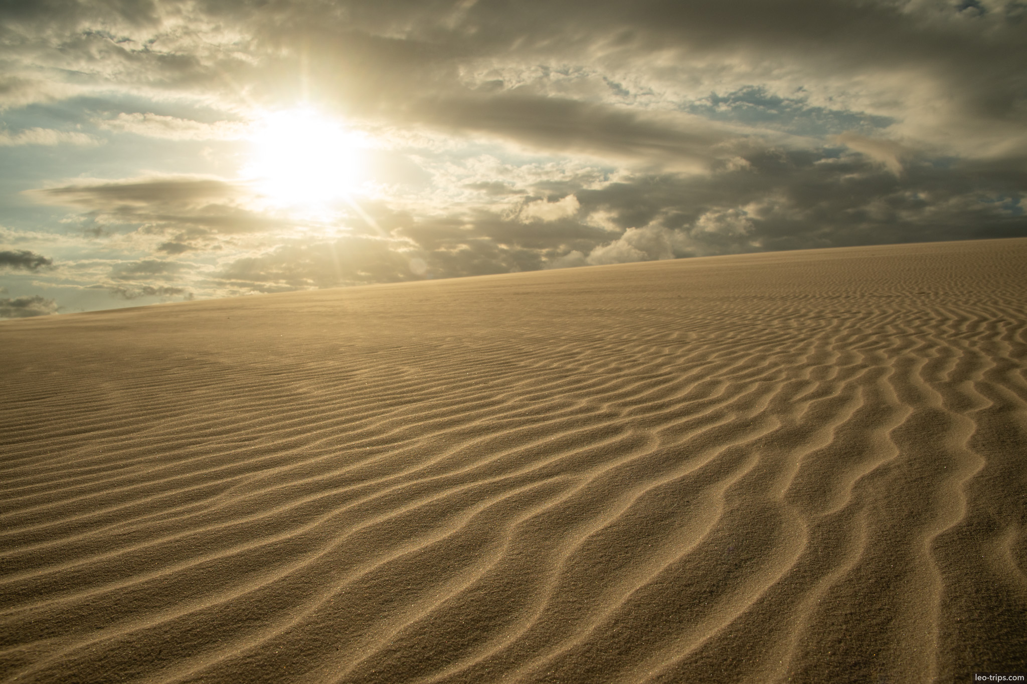 sunset sunburst rippled sand dunes lencois lencois maranhenses