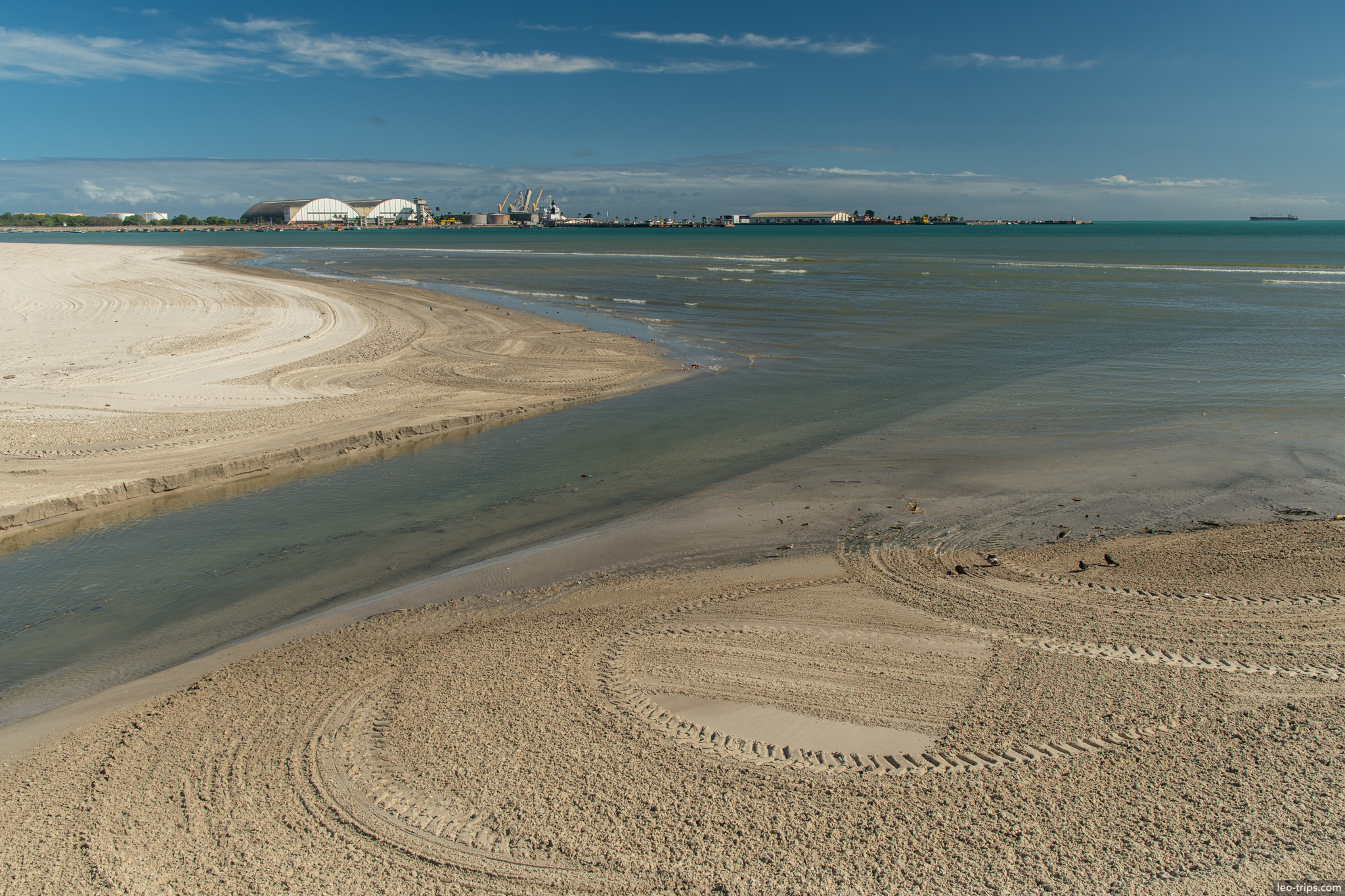maceio beach sandbar with port in background maceio