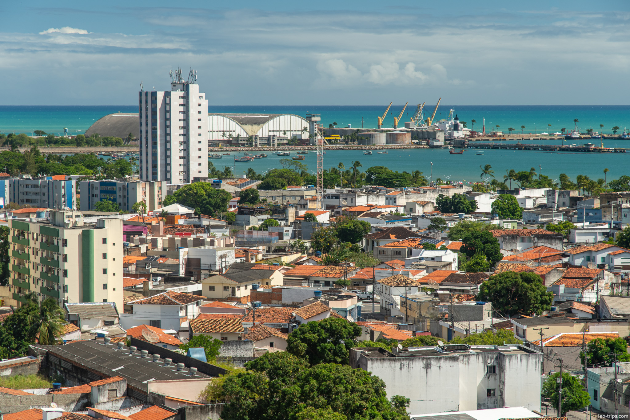 maceio city rooftops and port with cranes maceio