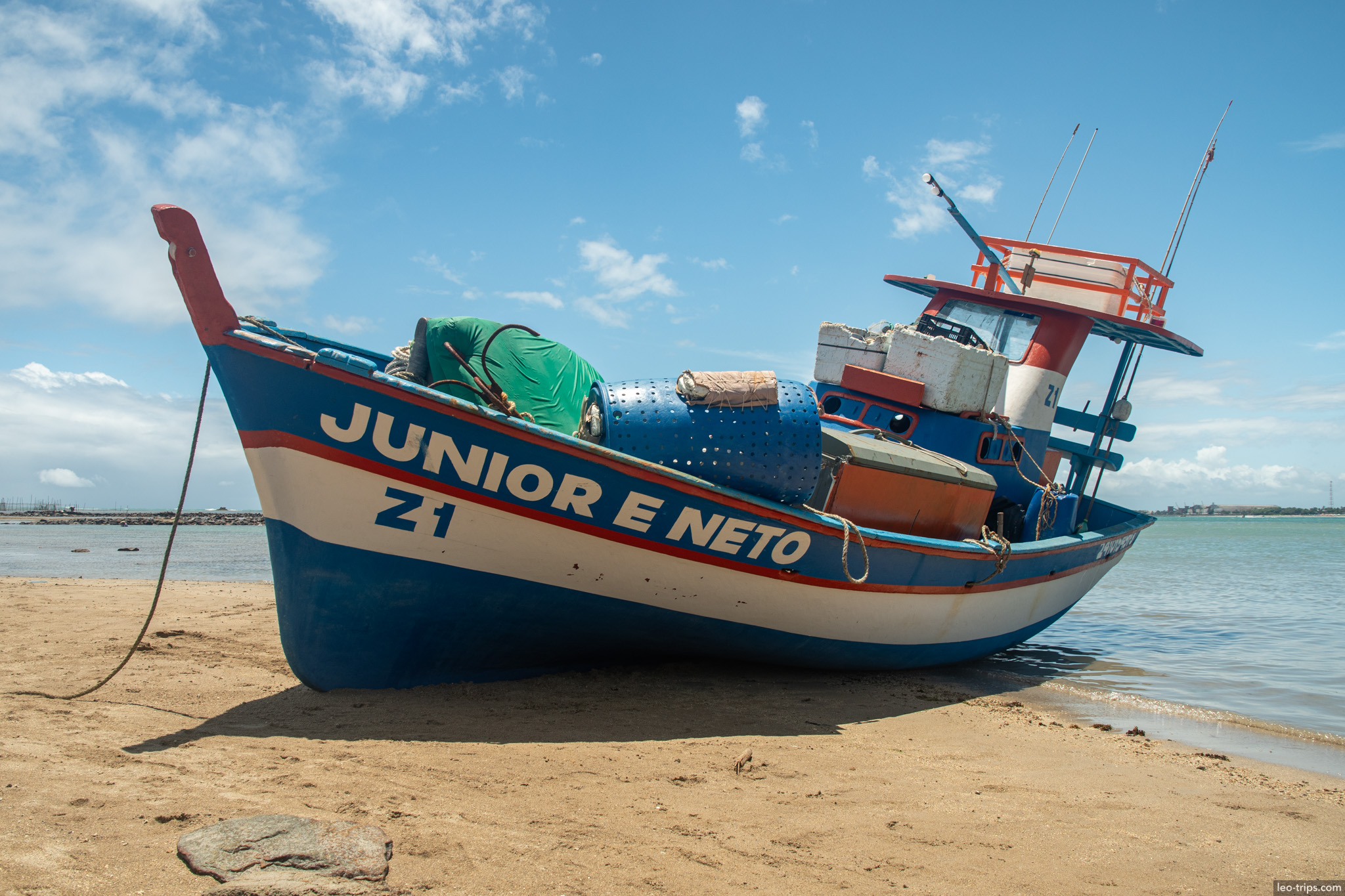 traditional fishing boat beached on sand maceio