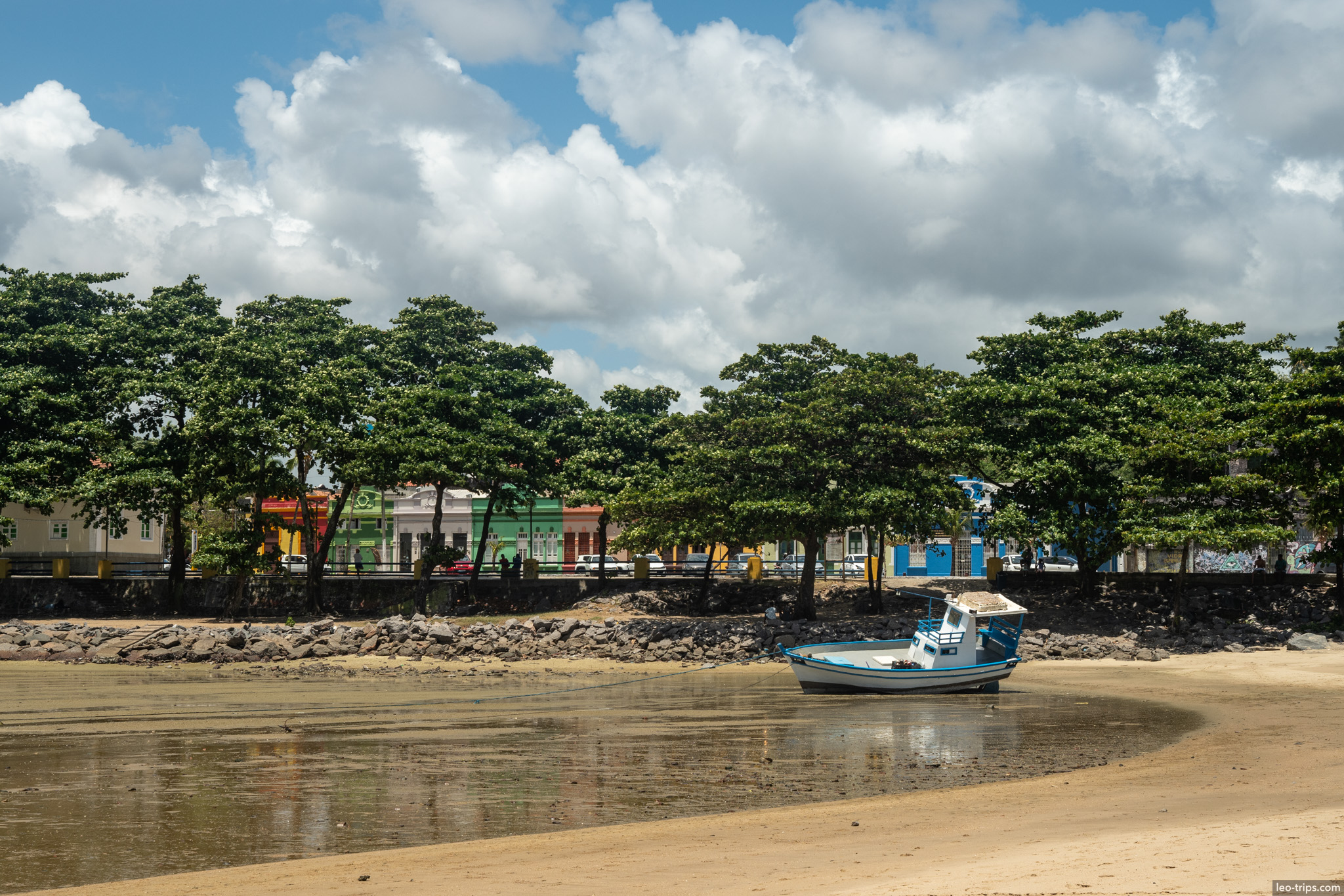 colorful colonial waterfront with fishing boat olinda olinda
