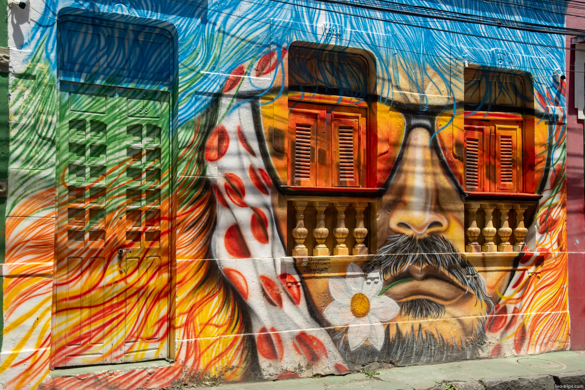 colorful graffiti bearded face on colonial building wall olinda olinda