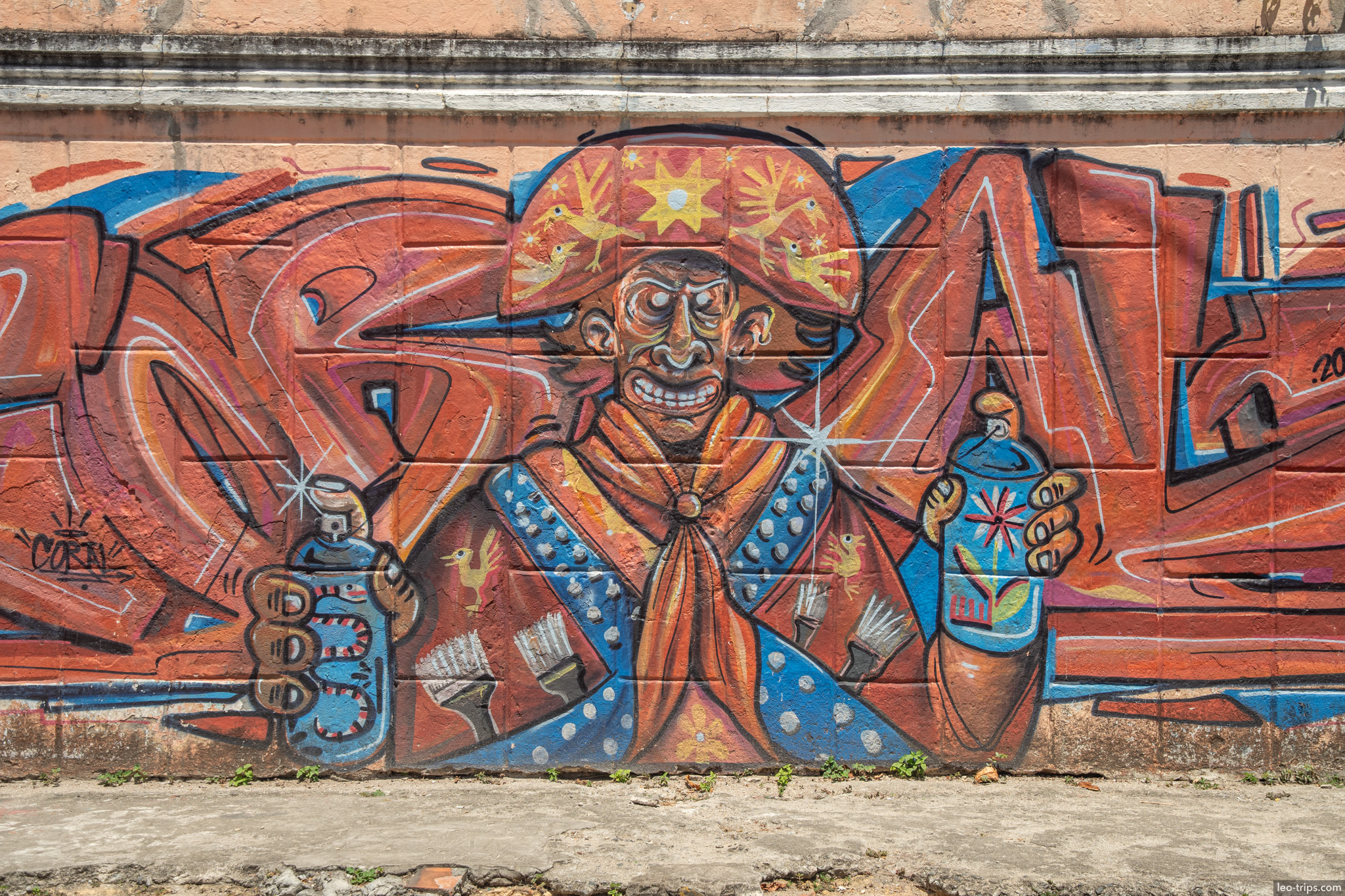 graffiti mural carnival figure with spray cans olinda olinda