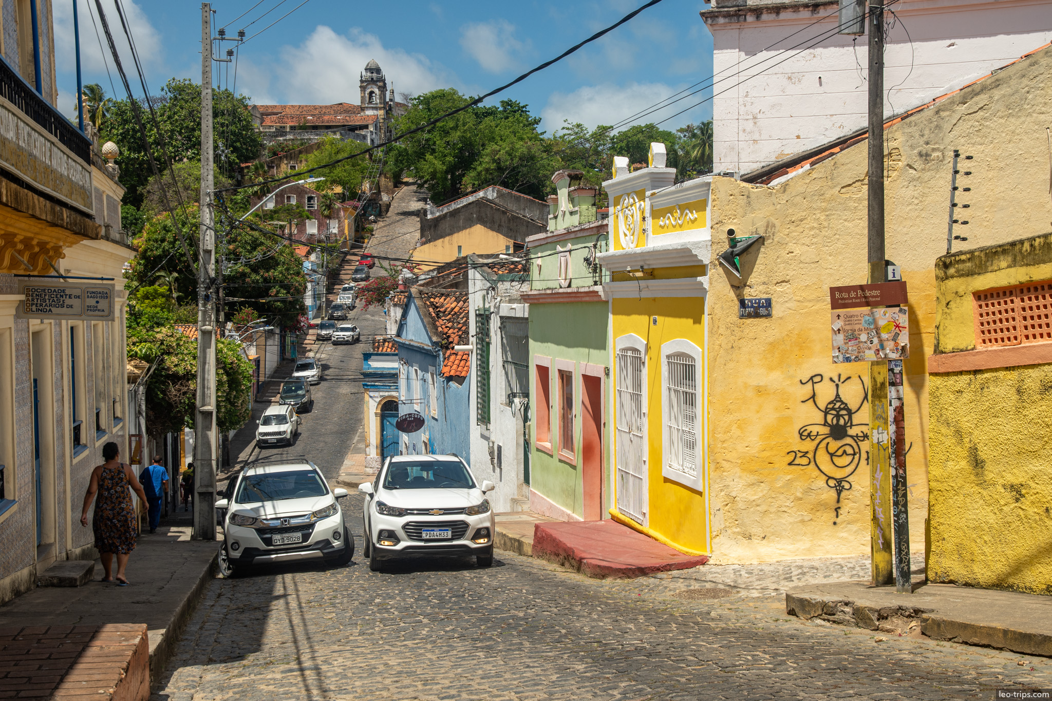 steep colorful colonial street church tower hilltop olinda olinda