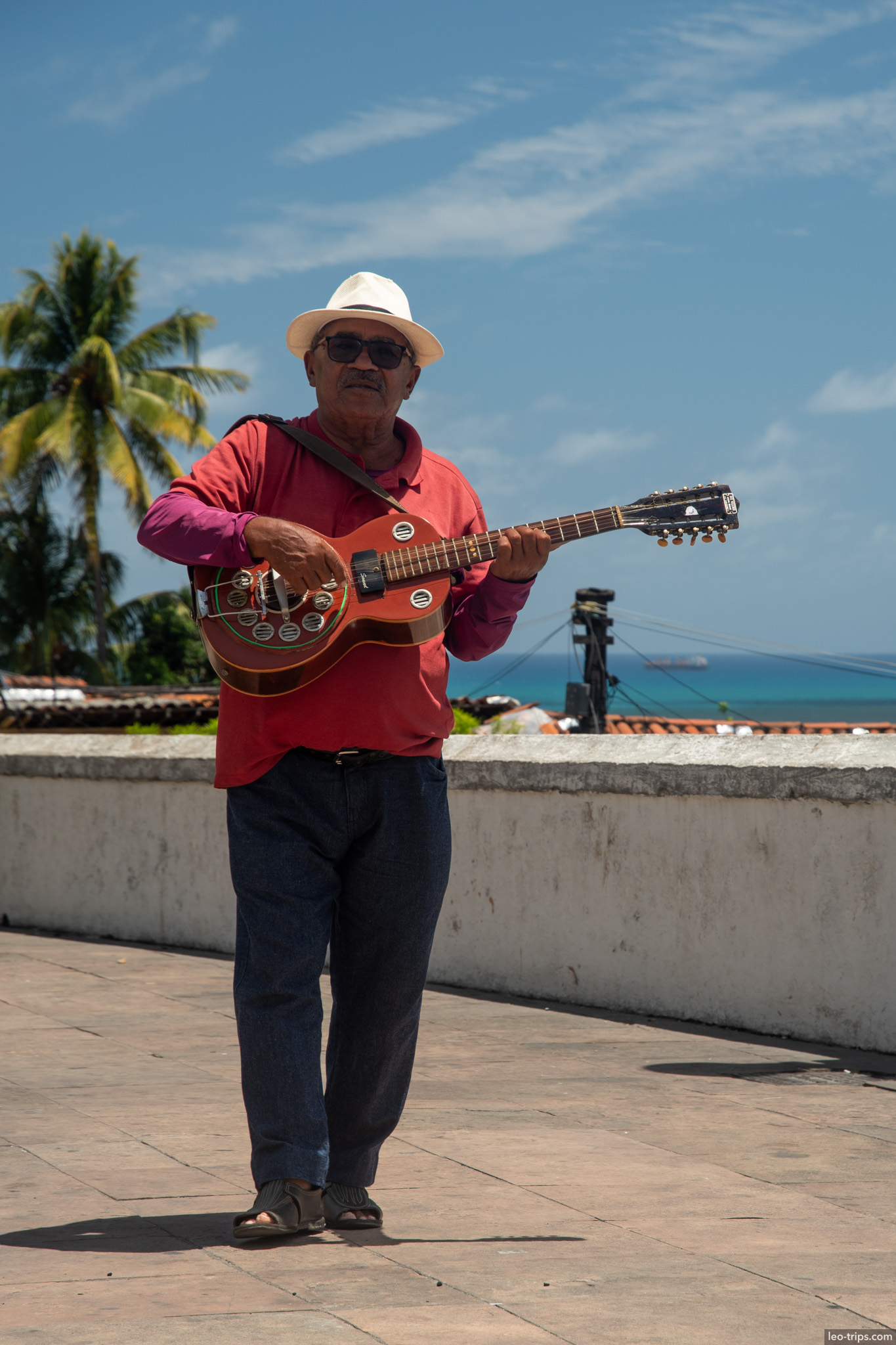 street musician playing guitar oceanfront terrace olinda olinda