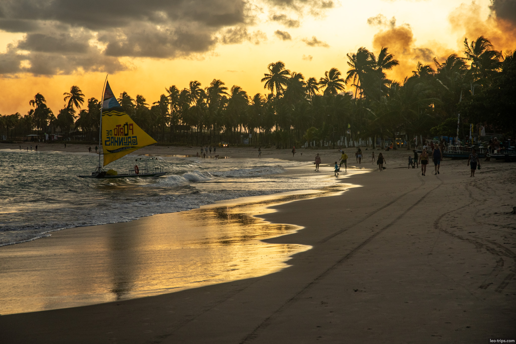 jangada yellow sail on beach at sunset porto de galinhas