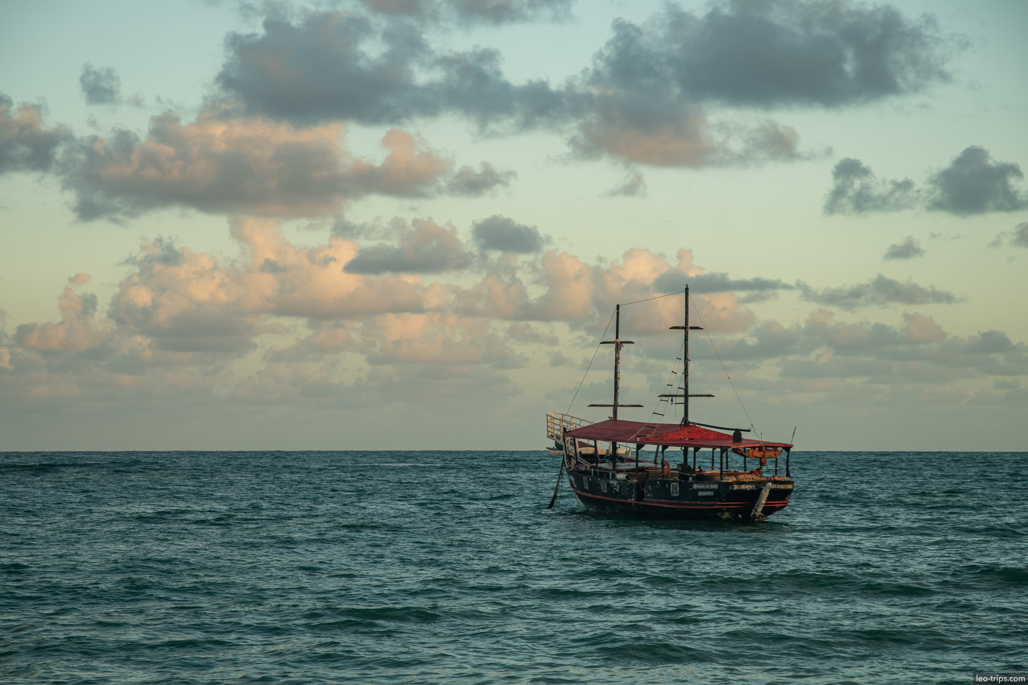 traditional tourist schooner on sea at dusk porto de galinhas