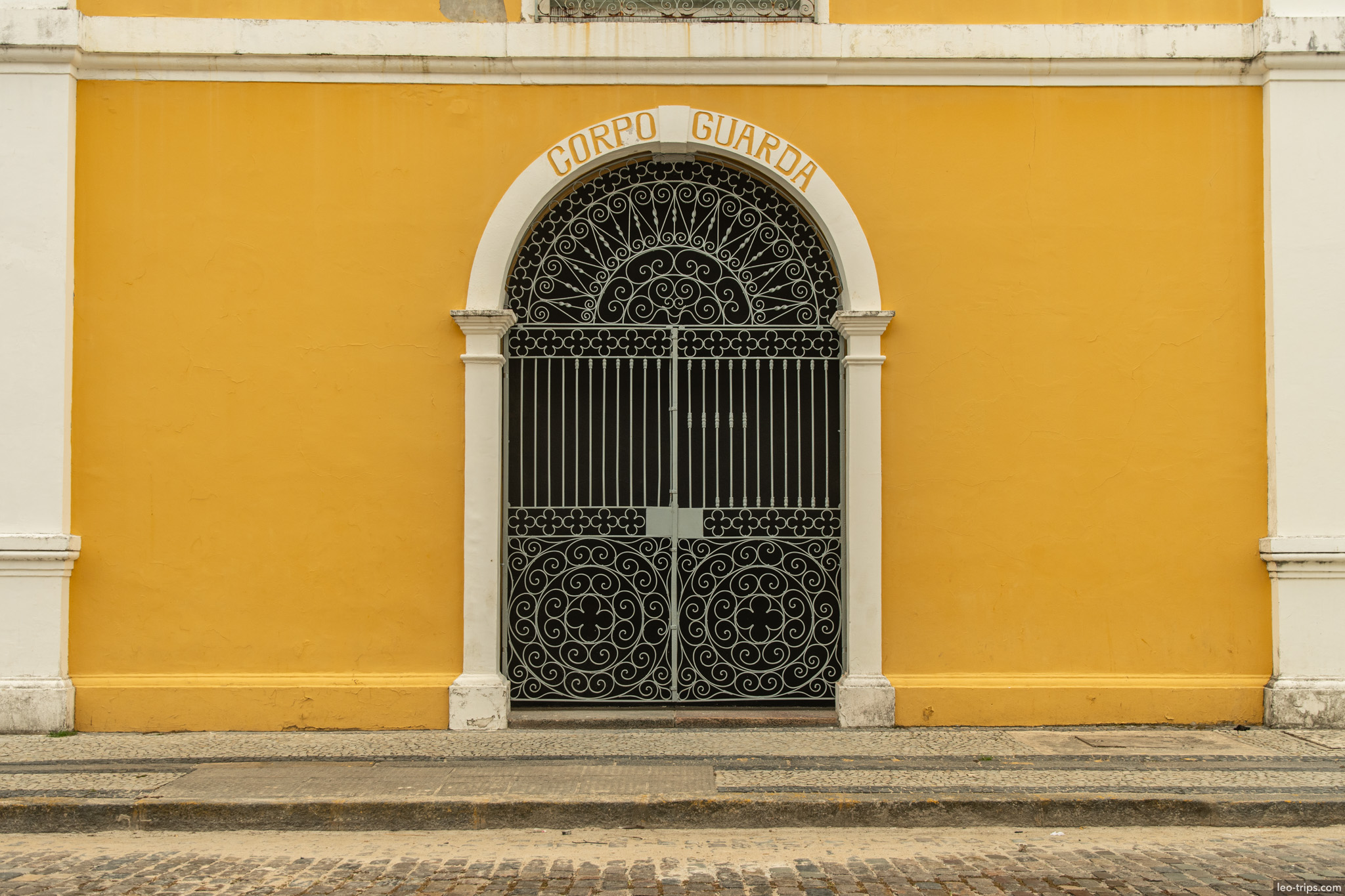 corpo guarda yellow wall wrought iron gate recife recife