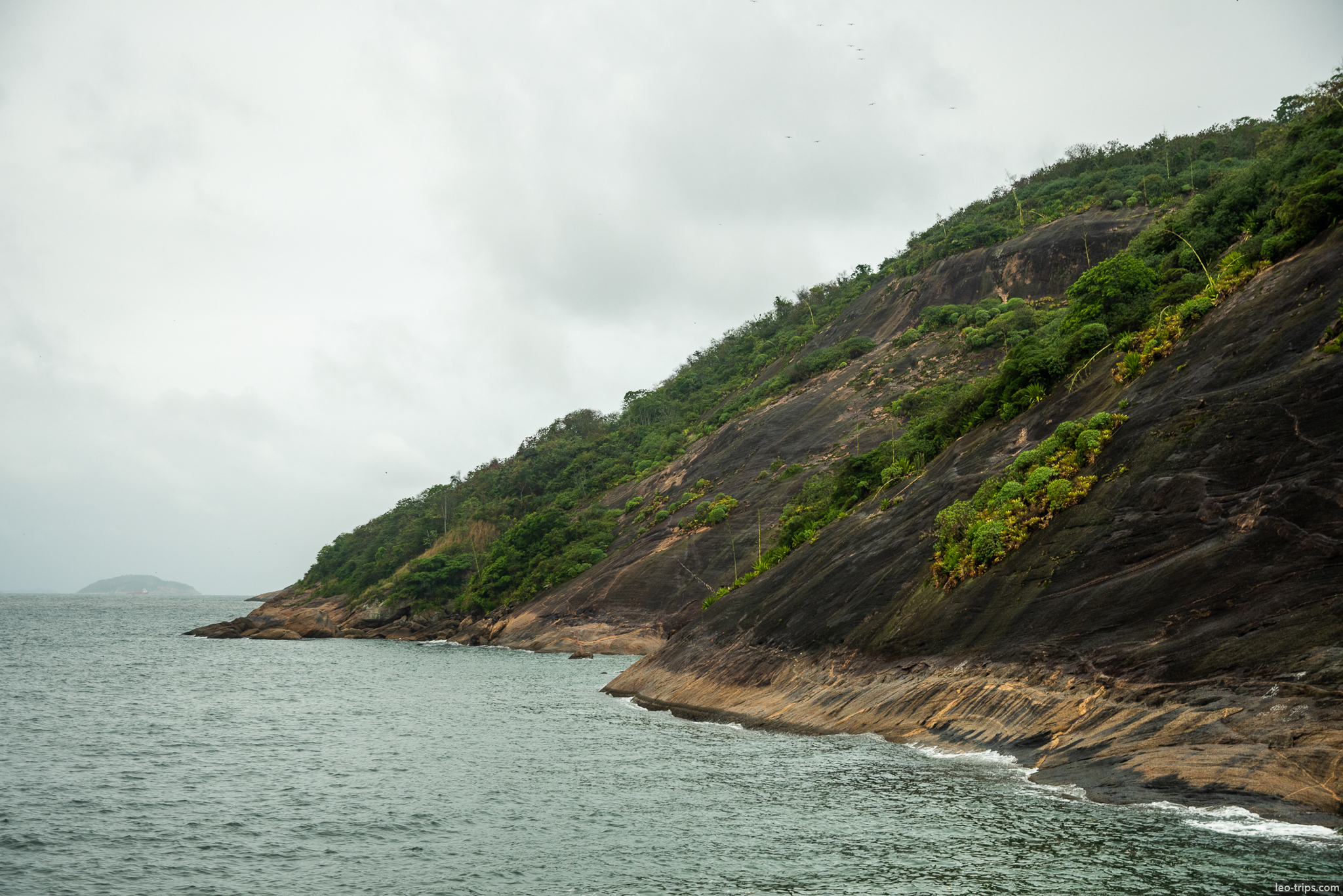 urca rocky coastline guanabara bay overcast rio de janeiro