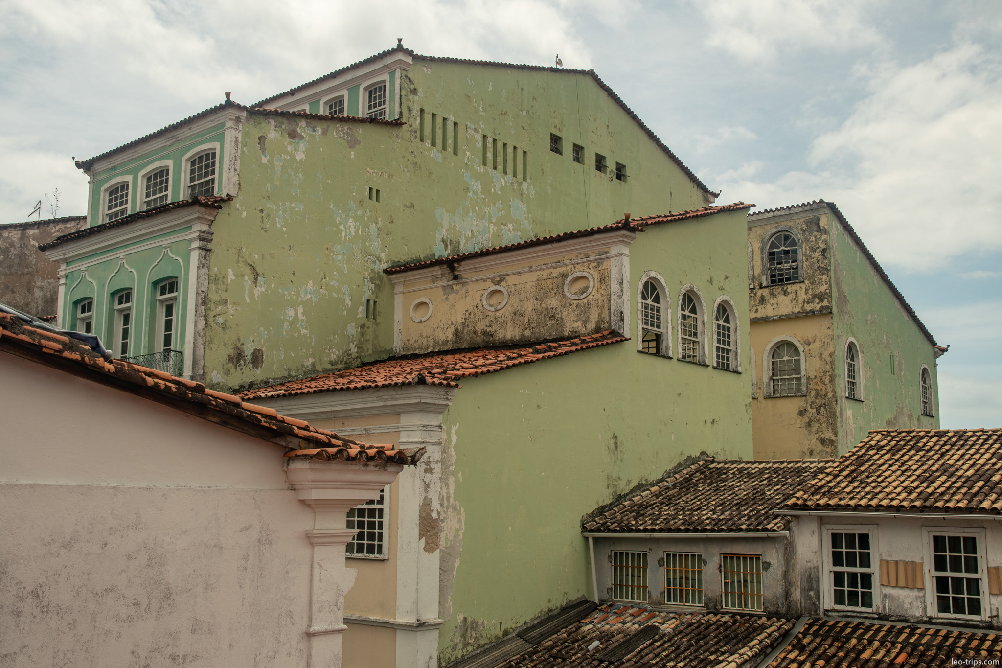 weathered green colonial buildings rooftops pelourinho salvador