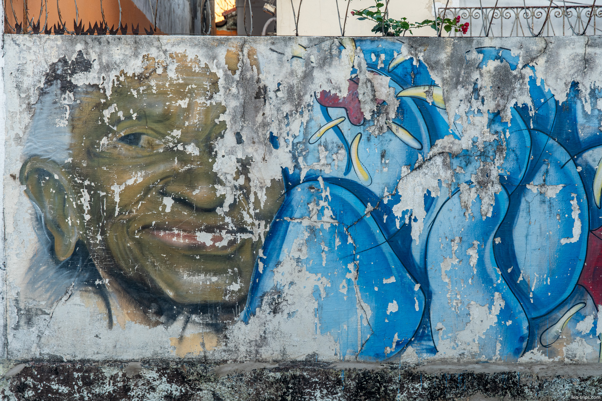faded portrait mural wall sao luis