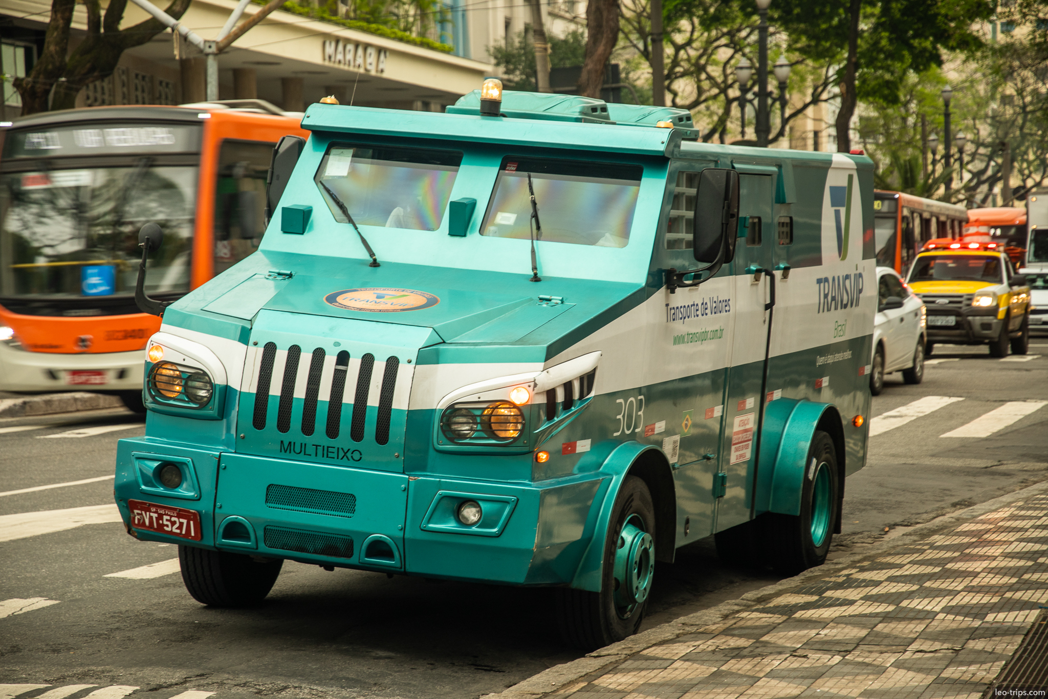 turquoise armored truck traffic sao paulo
