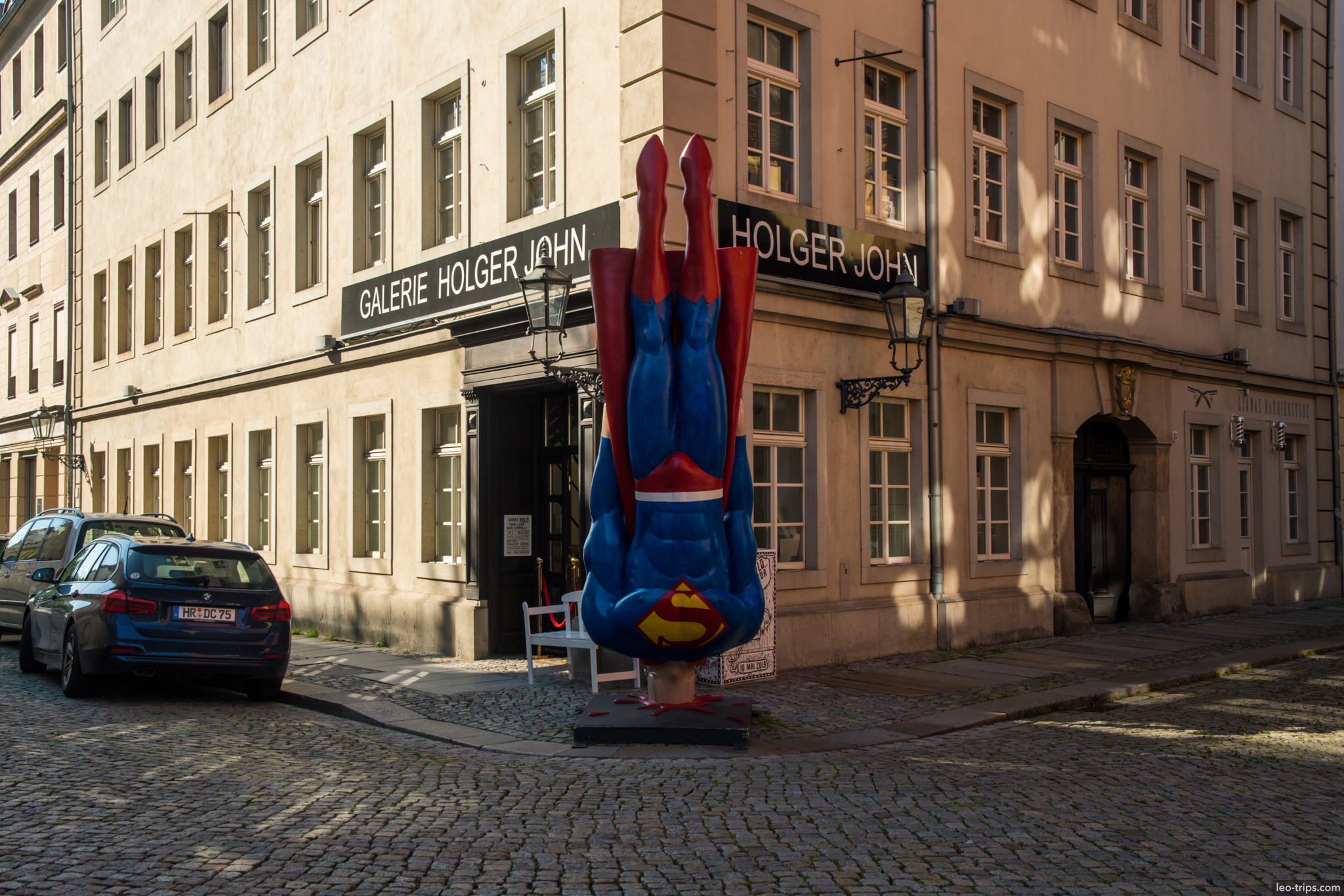 galerie holger john upside down superman sculpture dresden