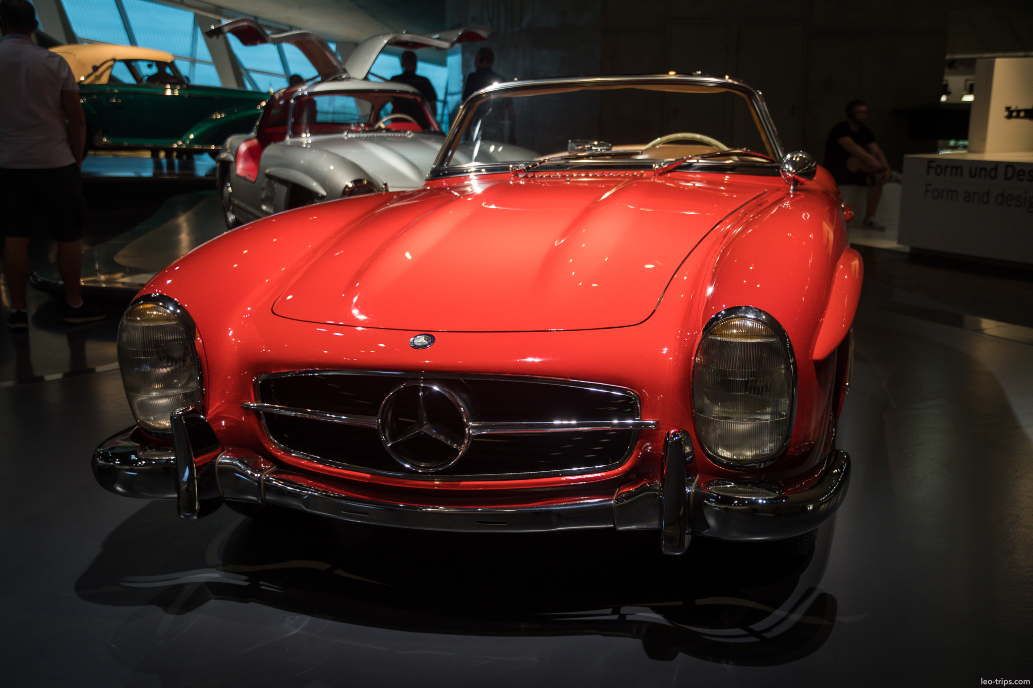 190sl red roadster 300sl gullwing background mercedes benz museum
