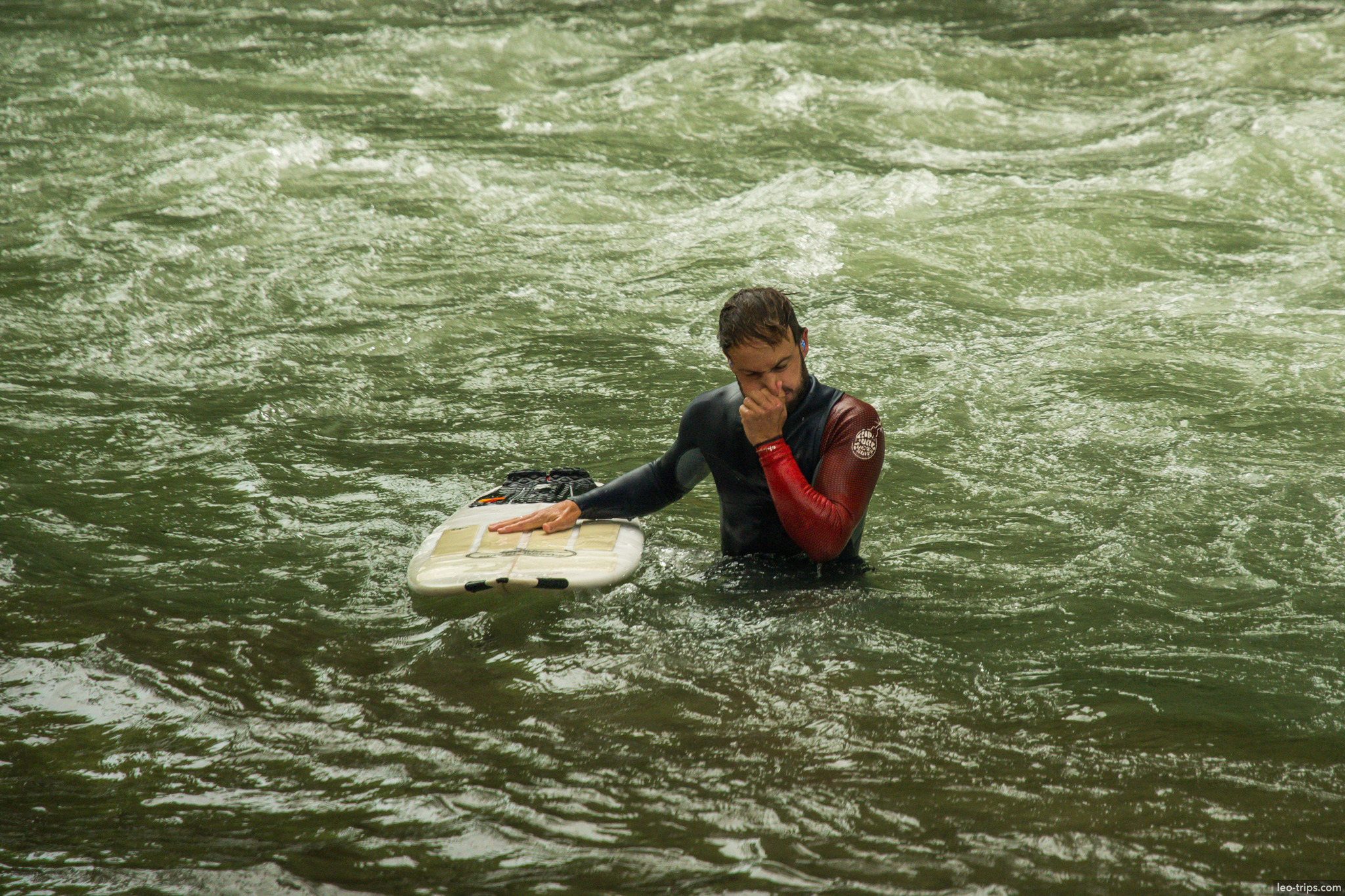 eisbach surfer wetsuit after fall englischer garten munich