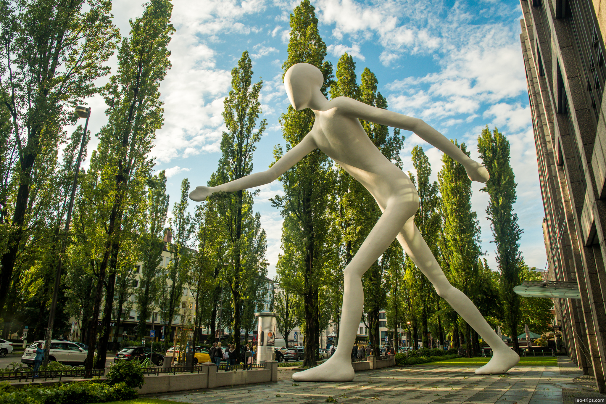 walking man sculpture white modern art munich munich