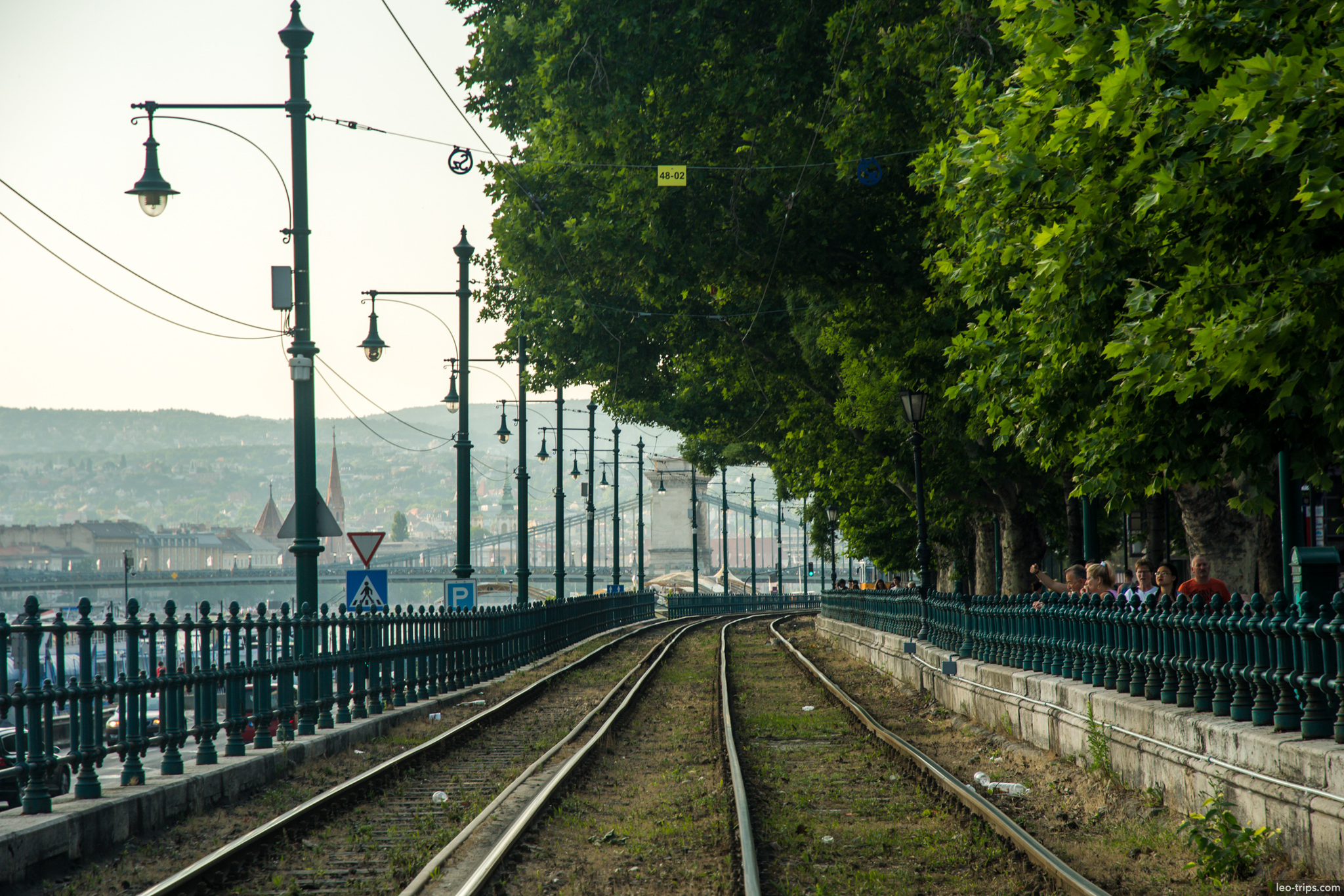 tram tracks danube embankment chain bridge trees budapest