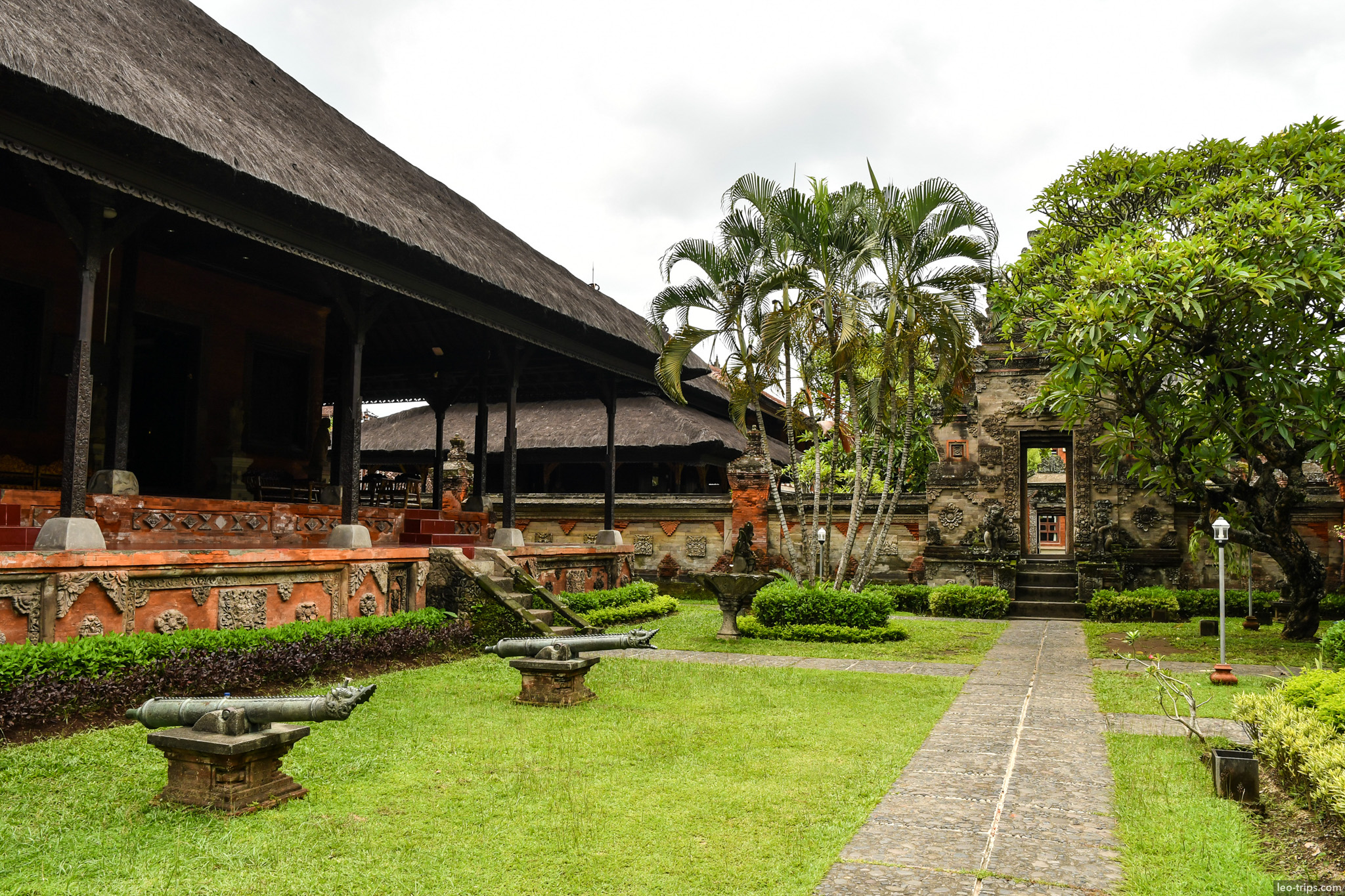 bali museum thatched pavilion with cannons bali