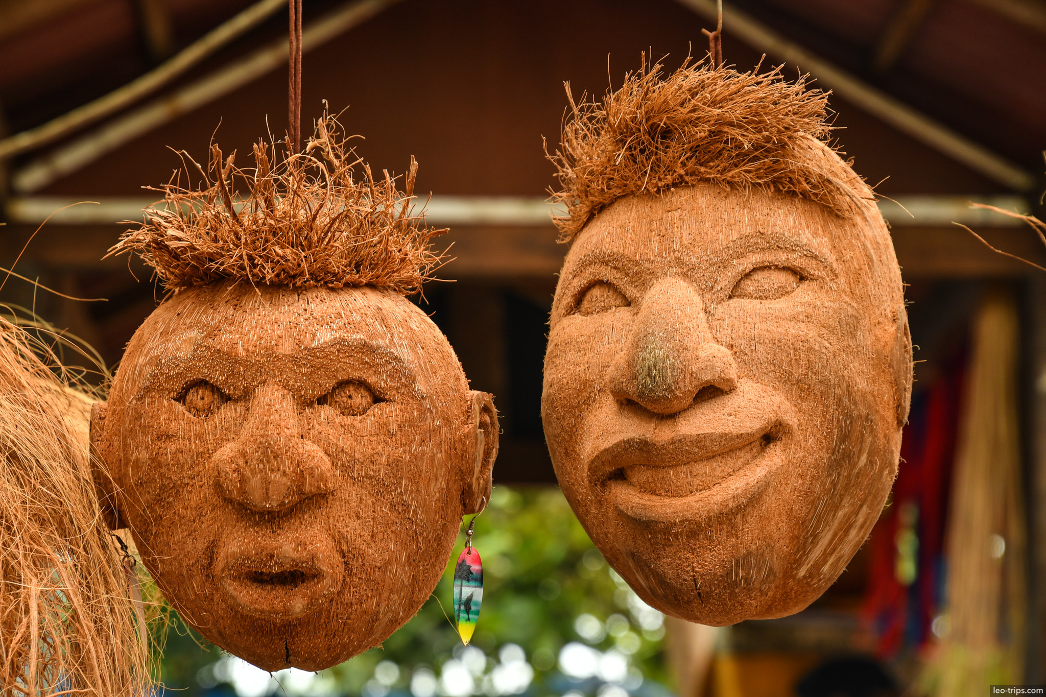carved coconut shell face souvenirs bali