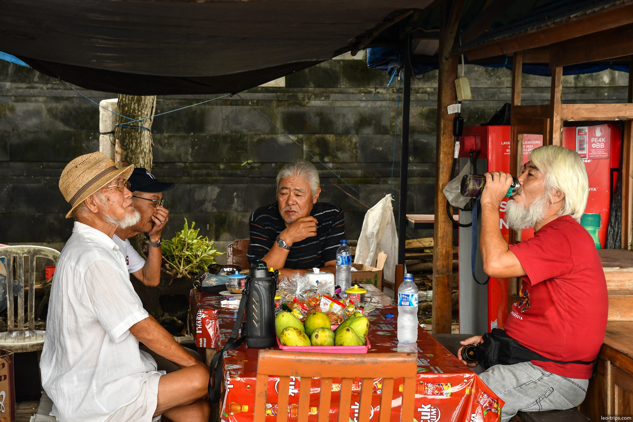 elderly men gathering at local warung bali
